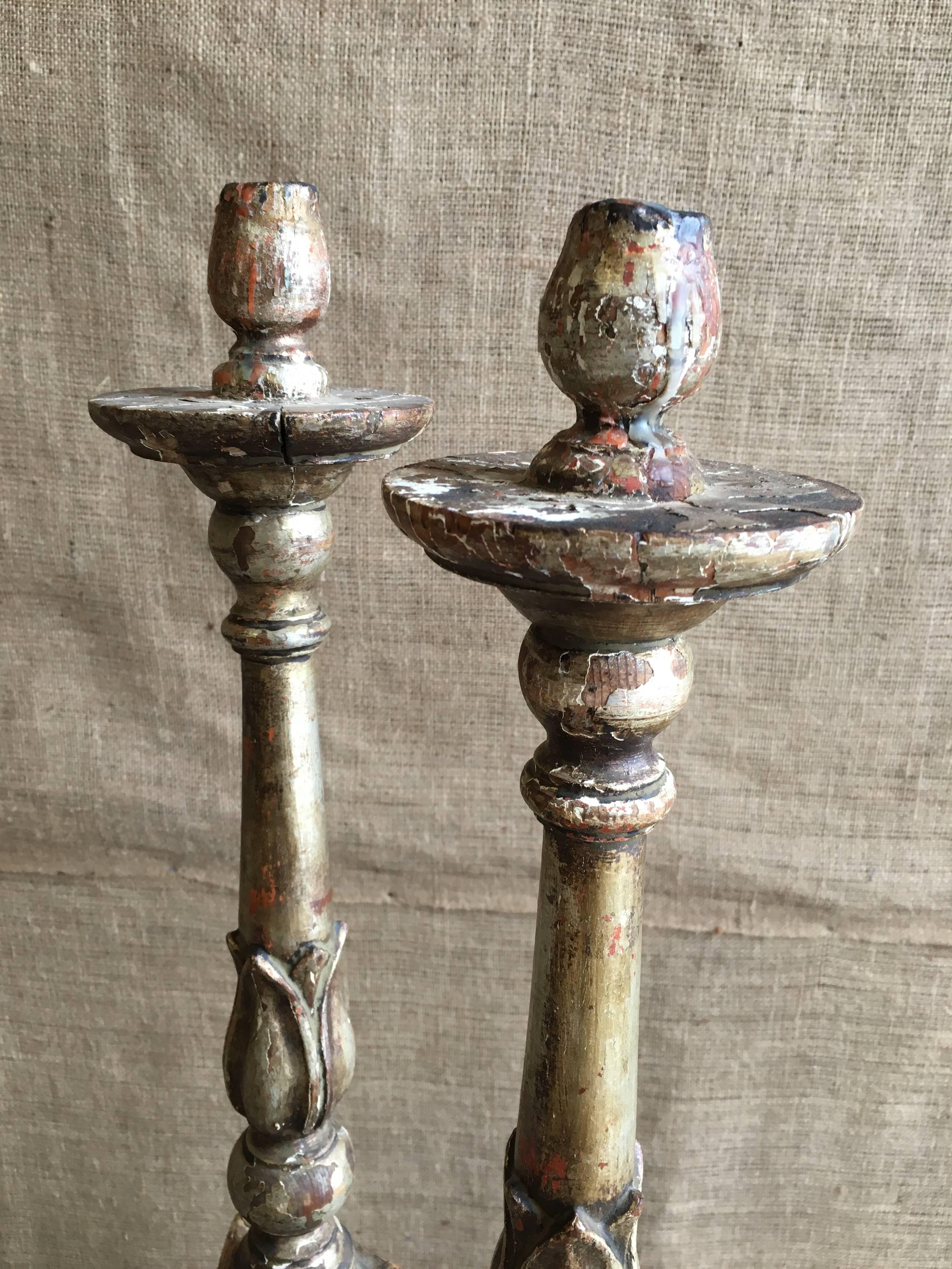 A pair of 18th century silver giltwood altar candlesticks, Italian or French, circa 1780.