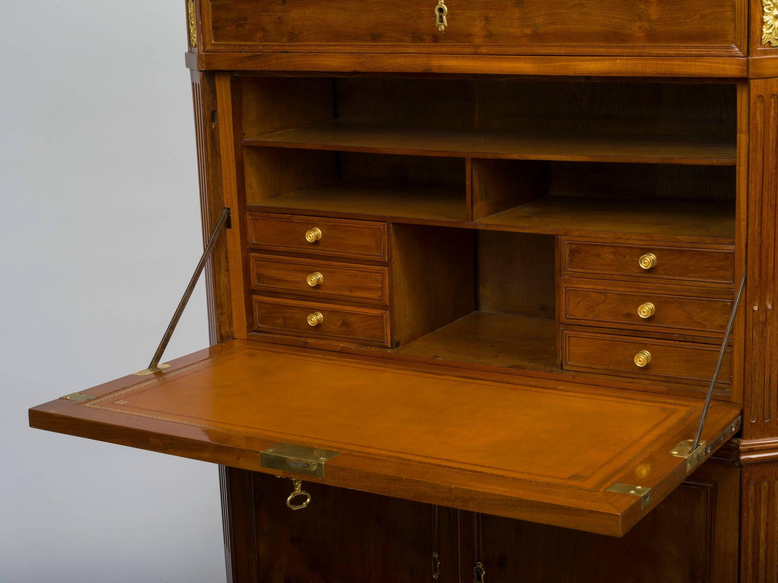 The later breccia marble top over two paneled doors opening to reveal shelves, above a drawer over a fall front with an interior fitted with drawers and compartments, and two further doors where the coffre-fort compartment used to be, raised on