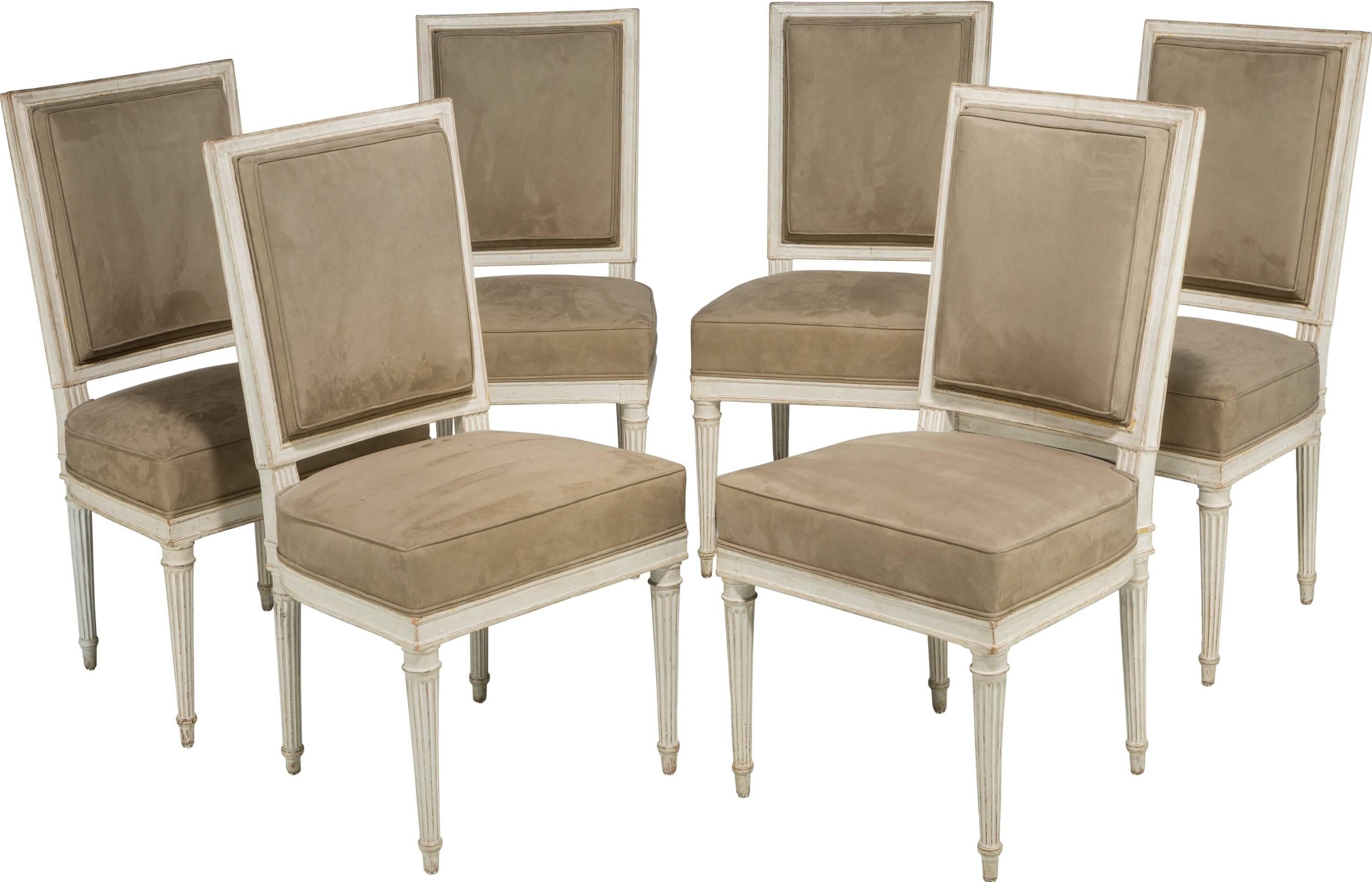 Each chair with rectangular padded back and seat, upholstered in suede, raised on four fluted tapering legs, stamped to interior front railing. 
Antoine Gailliard, maître in 1781, known for the beautiful quality of his work, very well proportioned,