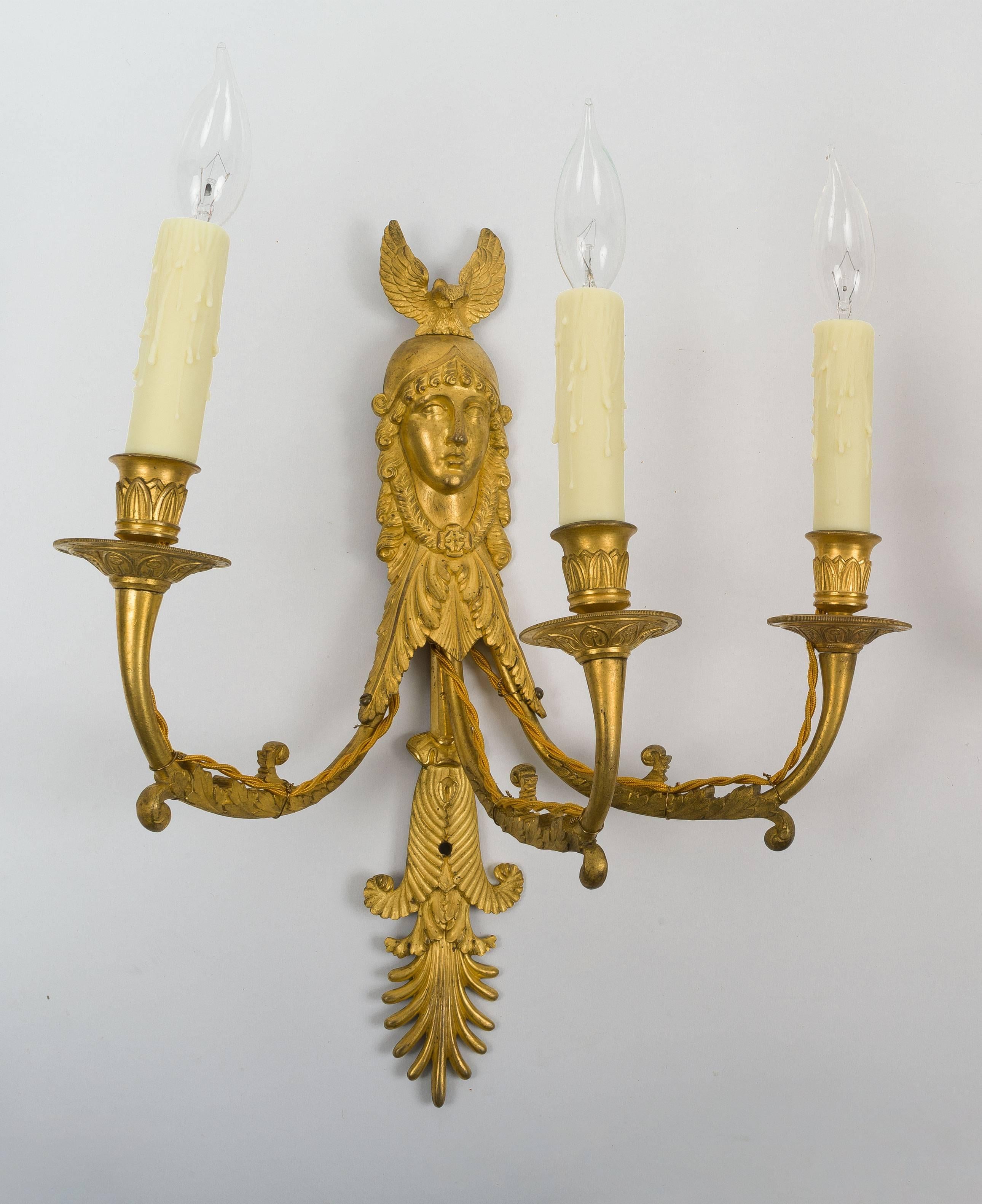 French Set of Four Empire Ormolu Three-Light Wall Sconces, Attributed to Ravrio For Sale