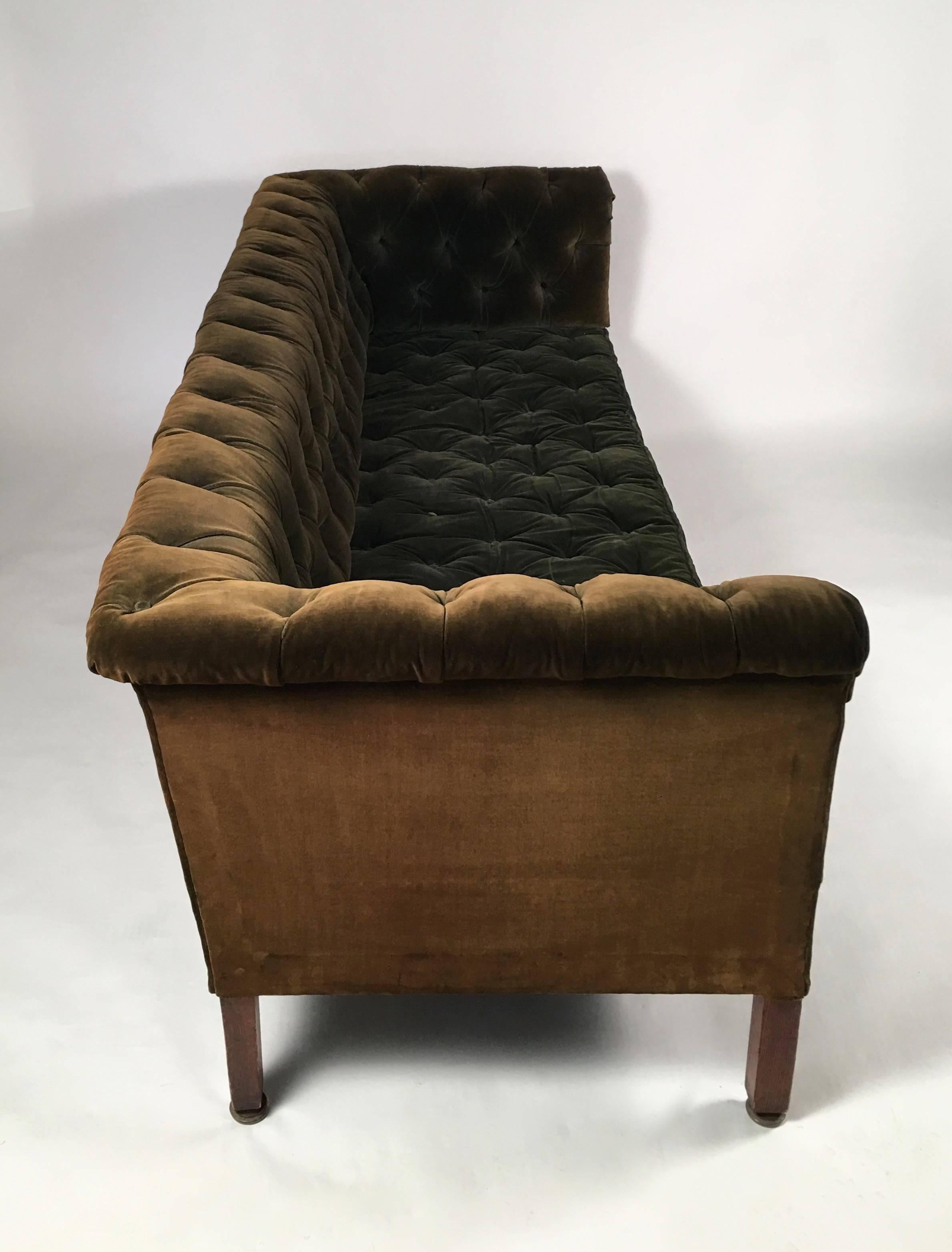 A 19th century forest green velvet Chesterfield sofa of rectangular form, the gifted back, seats and sides supported by four square-section oak legs, circa 1880s.

Provenance: Historic New England (formerly The Society for the Preservation of New
