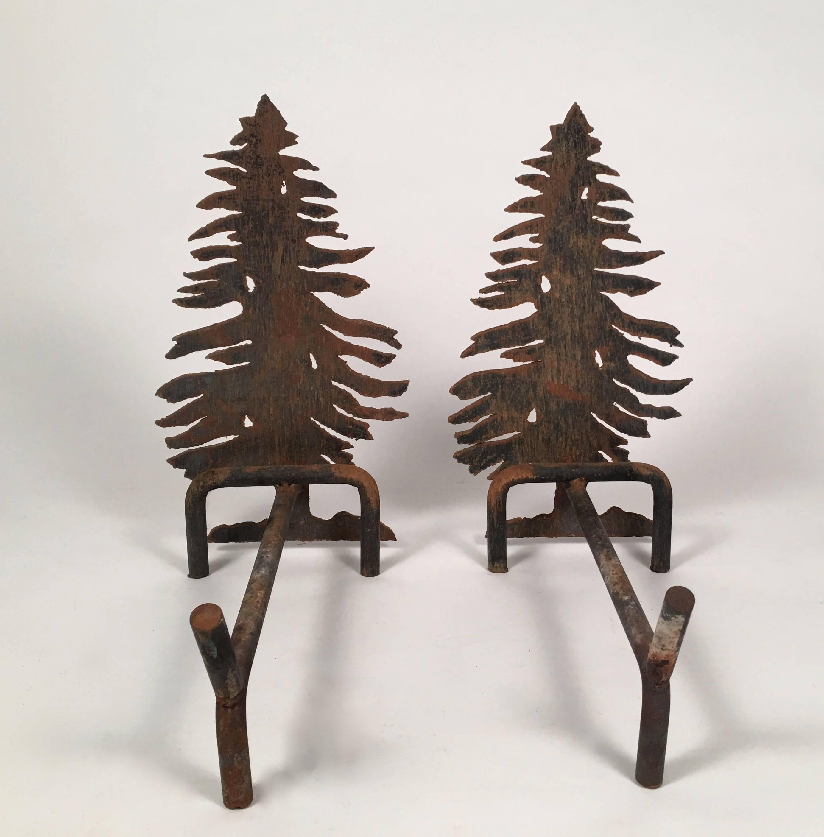 Pair of unusual tree-form andirons in cut iron, with welded iron rod fire dogs.