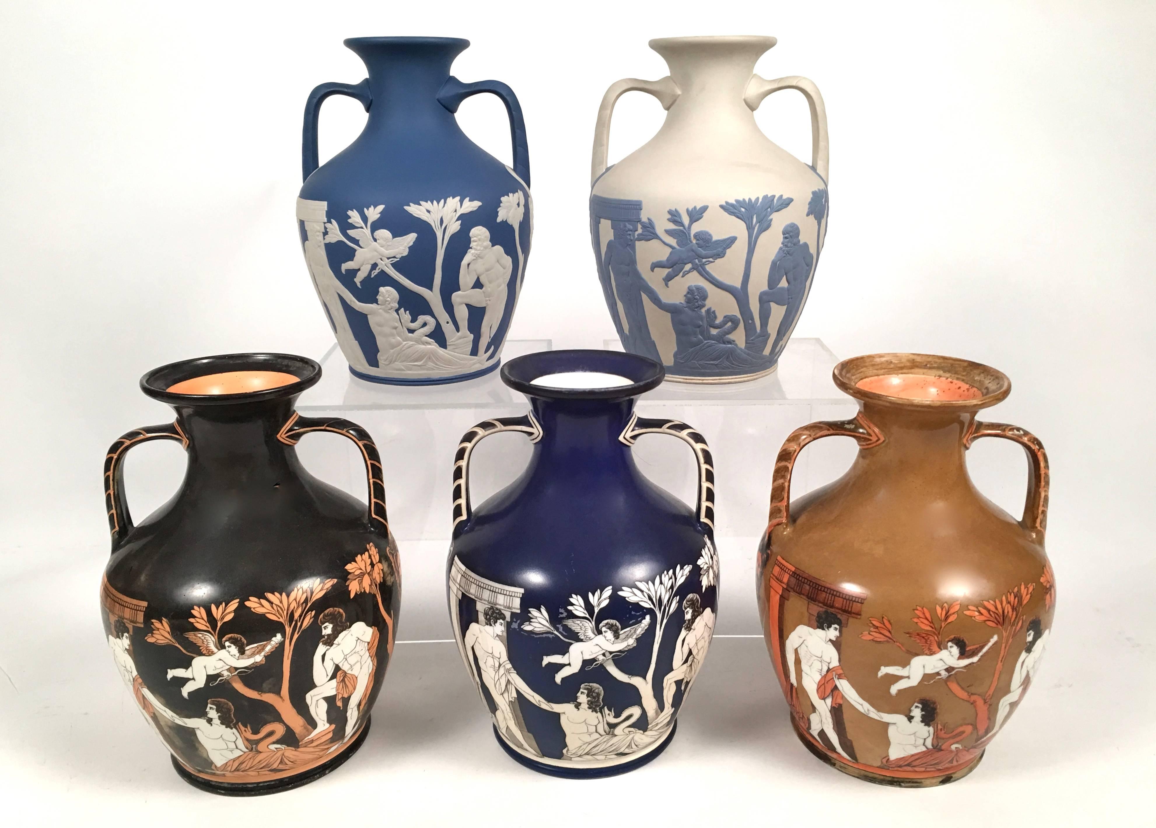 A rare collection of five versions of the legendary Portland vase--one of the most famous glass masterpieces from Roman Antiquity, and a source of inspiration to glass and porcelain makers for centuries--comprising two 20th century examples in