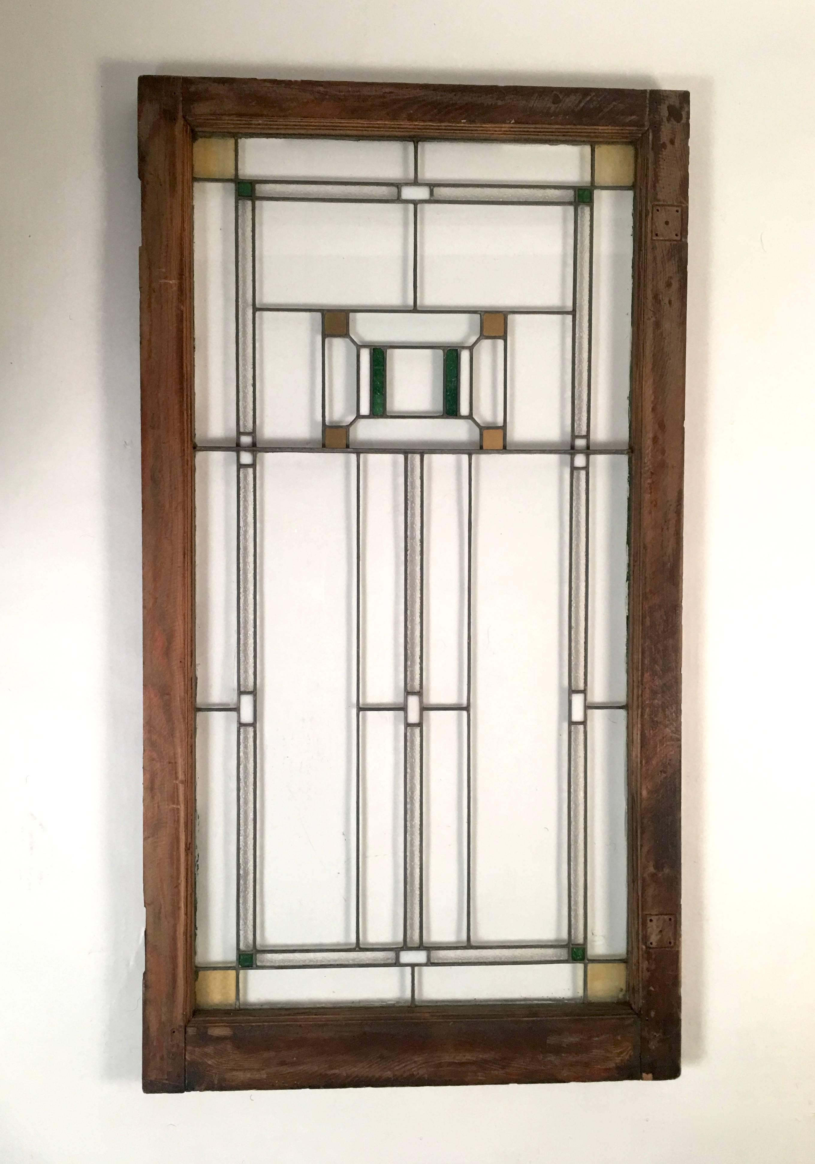 Two American Arts & Crafts period Prairie School windows, in the manner of Frank Lloyd Wright, possibly by George Grant Elmslie, who was an assistant of Louis Sullivan. Excellent condition. Clear glass, both flat and textured, with rectangles and