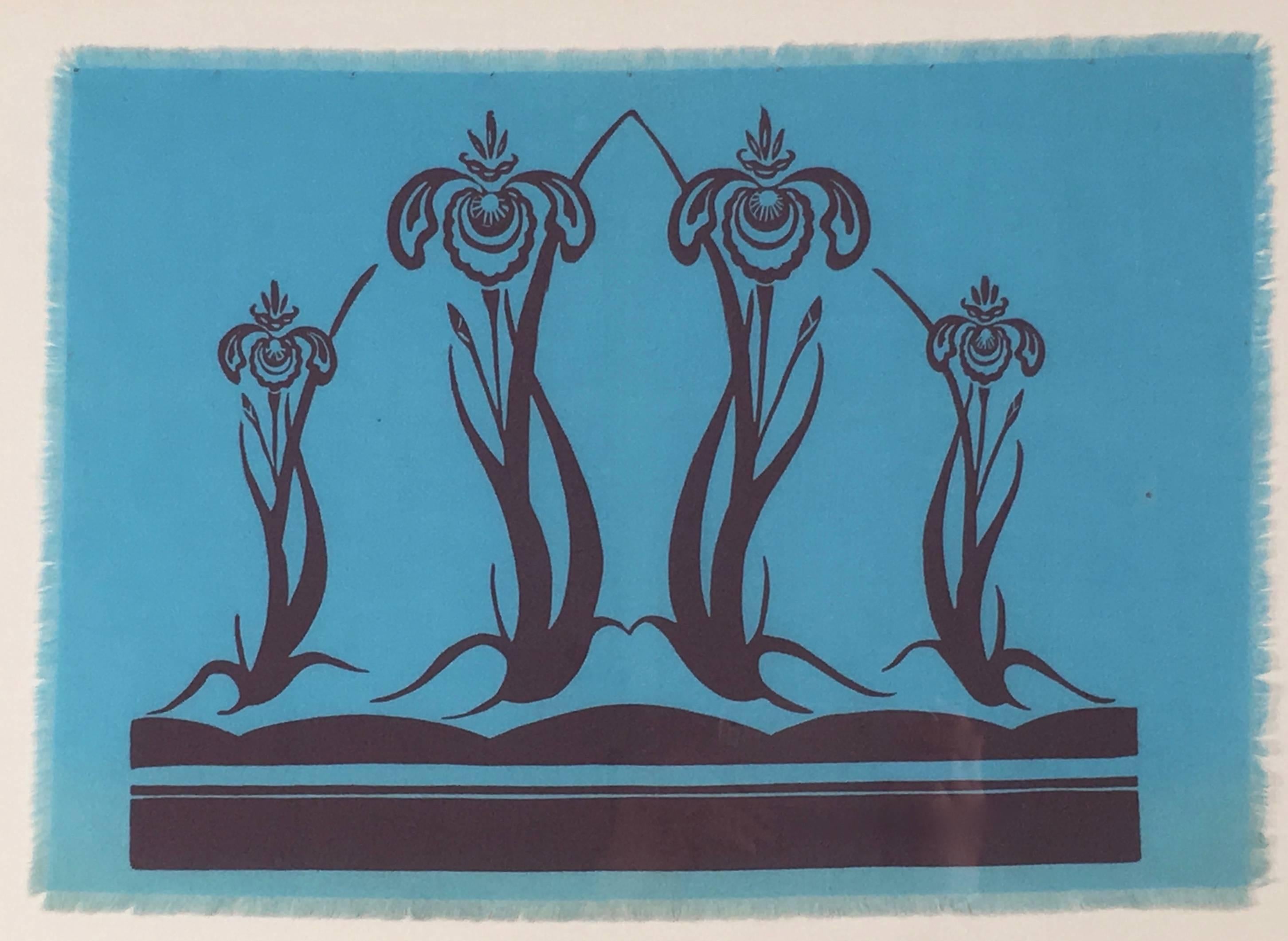 An original hand block printed Folly Cove Designers textile in the Iris pattern by Elizabeth Holloran, featuring a graphic composition of four irises in graduated sizes, printed in burgundy on blue cotton with fringe, archivally mounted on linen in