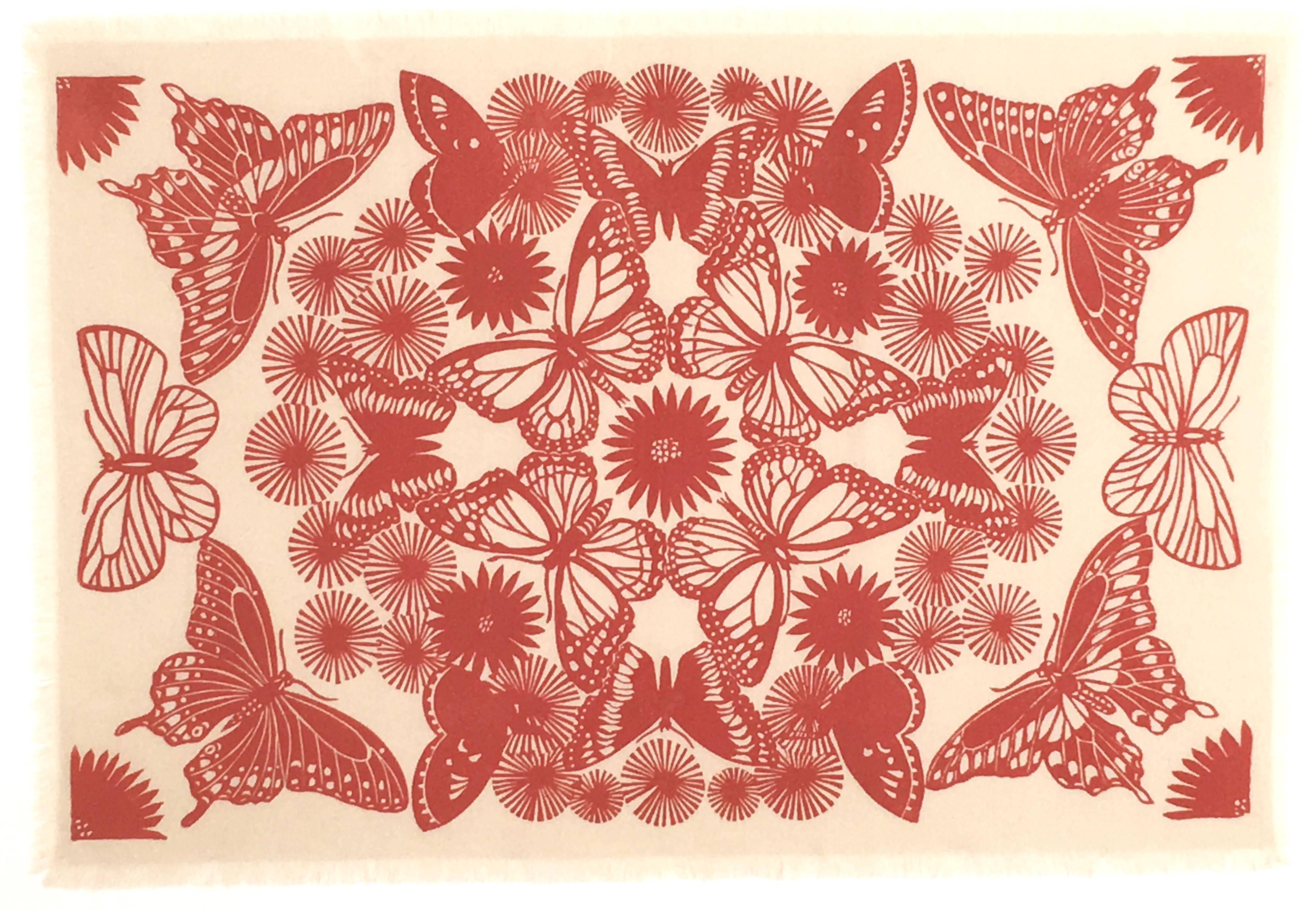 An original hand block printed Folly Cove Designers textile in the Field Trip pattern by Lee Natti, featuring a graphic composition of butterflies and flowers in concentric circles, printed in tomato red on cream cotton with fringe, archivally