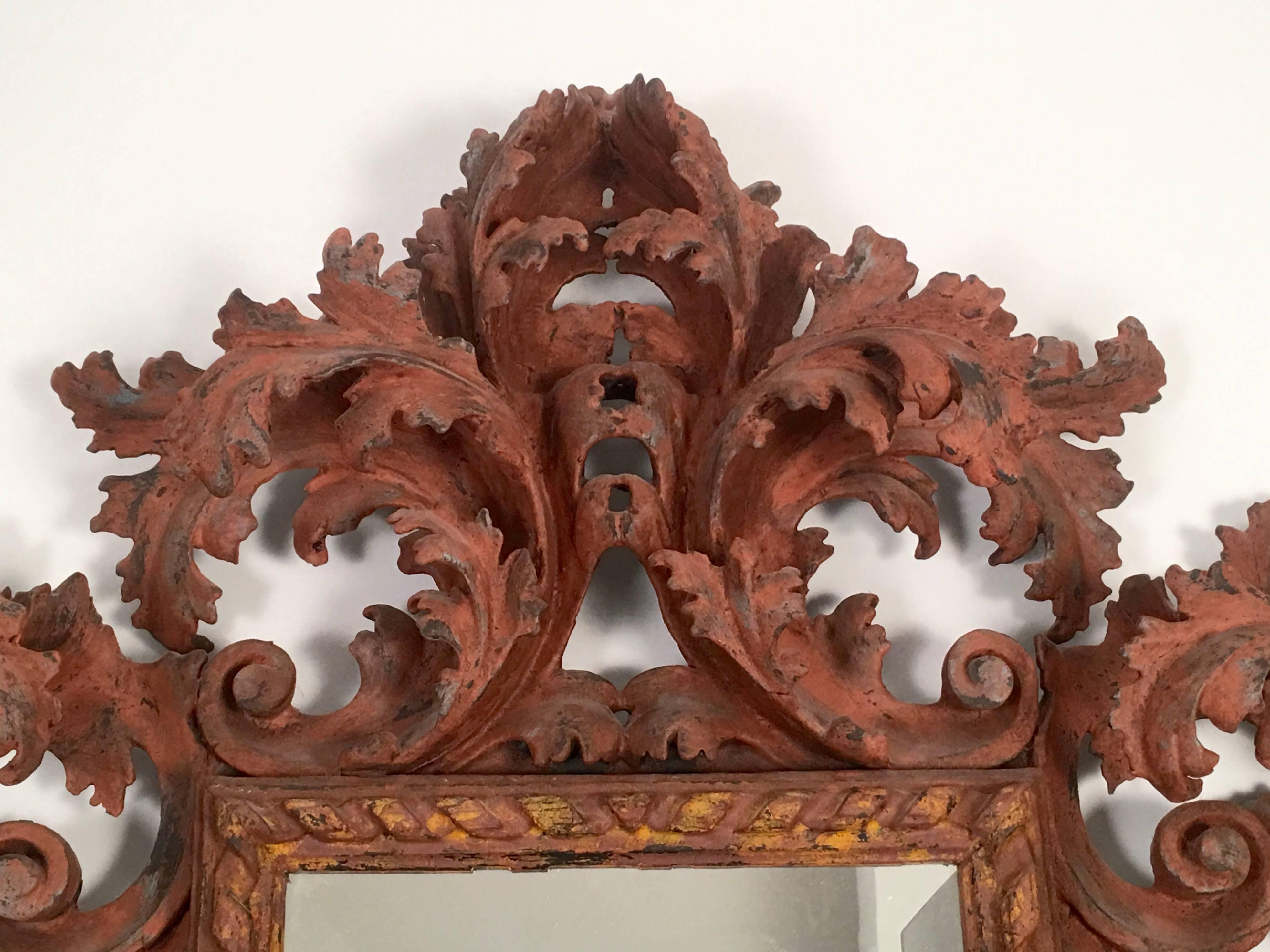 Italian Baroque Style Carved and Salmon Painted Wood  Mirror In Good Condition In Essex, MA