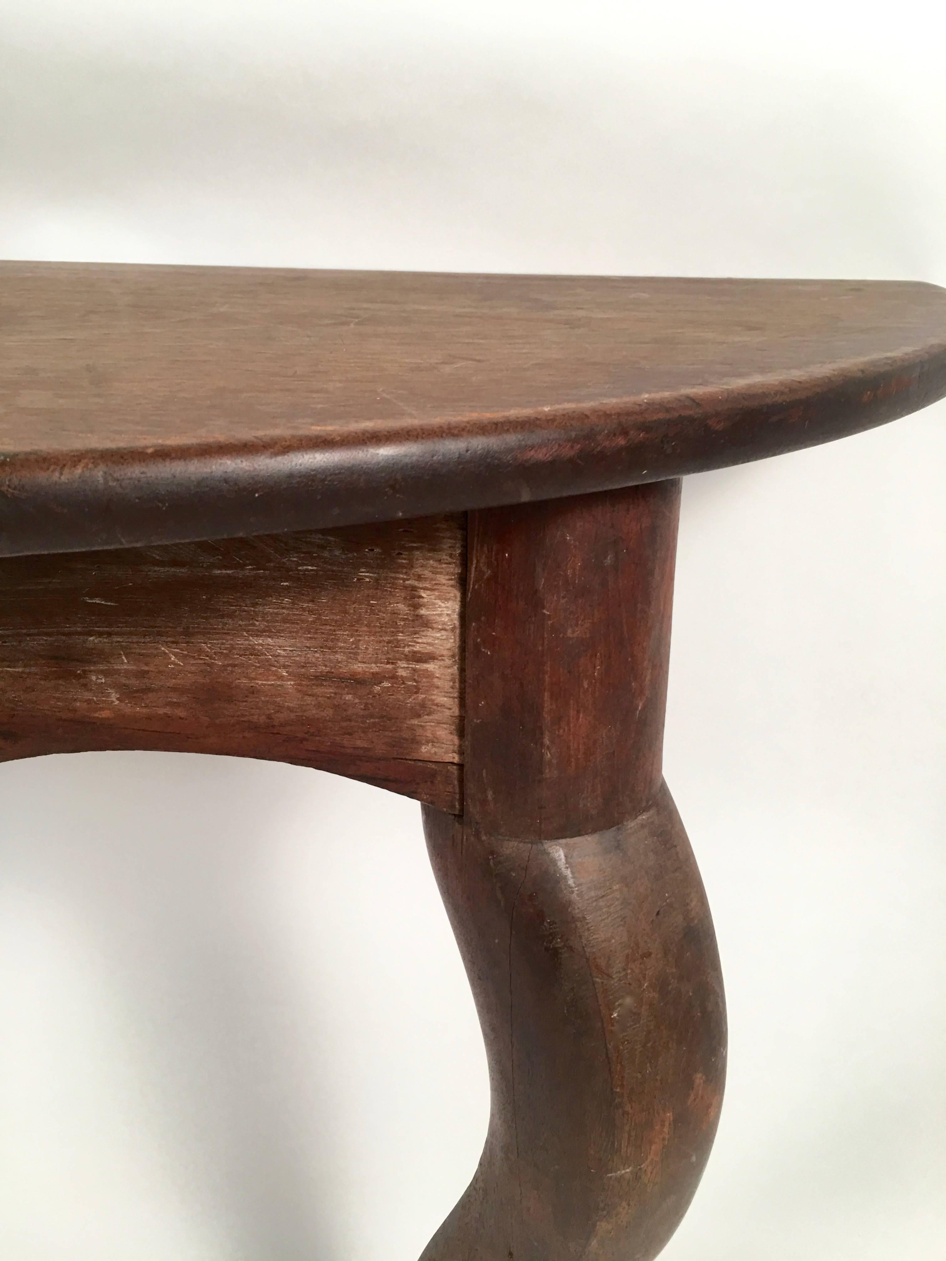 Carved Pair of Walnut Demilune Tables