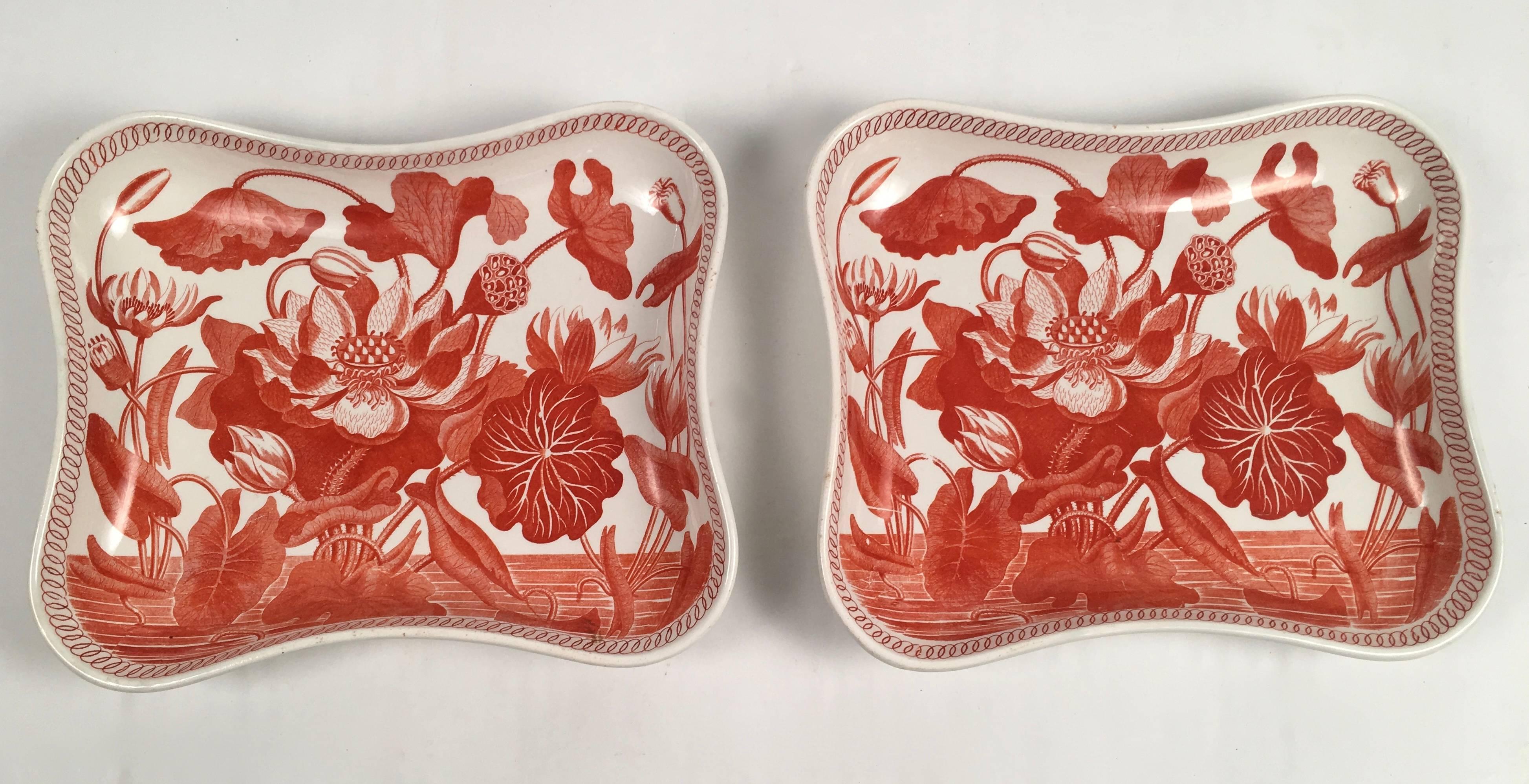 A rare pair of dessert dishes in the Water Lily pattern from the Darwin service, designed in 1806 and made only during a three year period, from 1808-1811 by Josiah Wedgwood and Sons, in earthenware, transfer printed in iron red with large, crisp