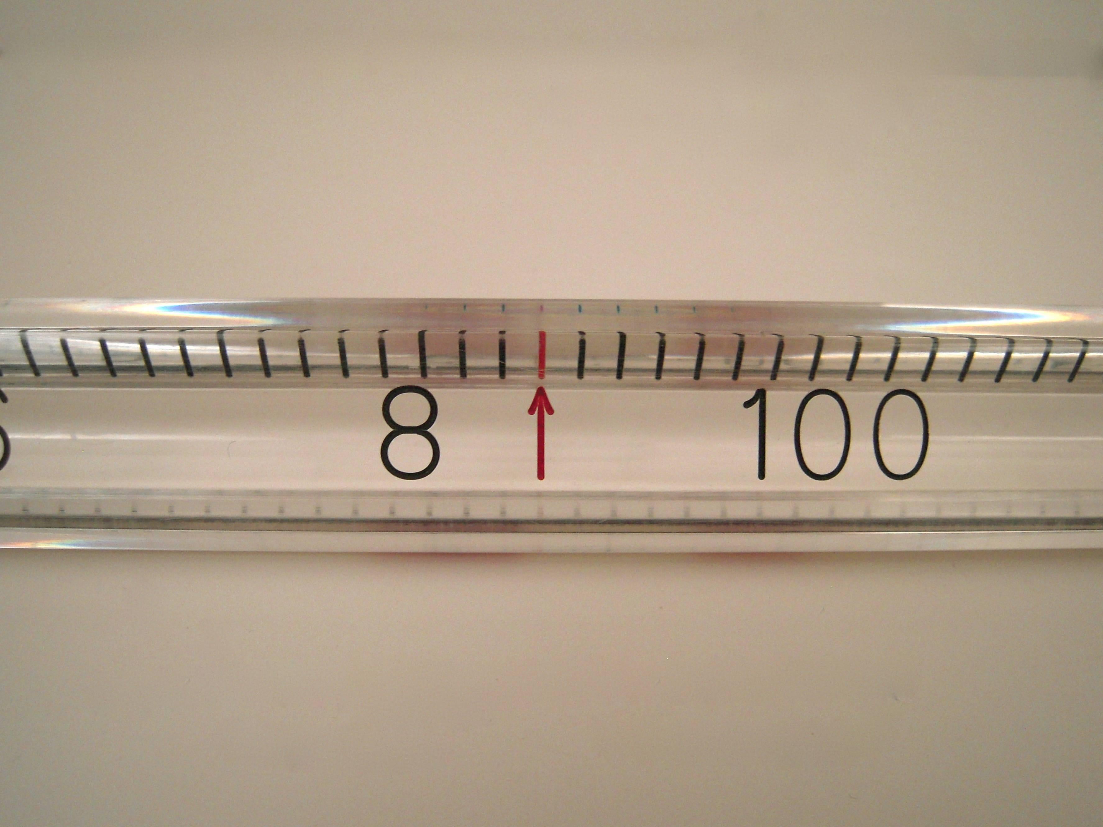 An unusual, large 1940s acrylic model teaching thermometer (with original moveable black ribbon, not mercury, inside), together with its original wood box, retaining fragments of its original paper label from Kencraft Exhibits and addressed to an