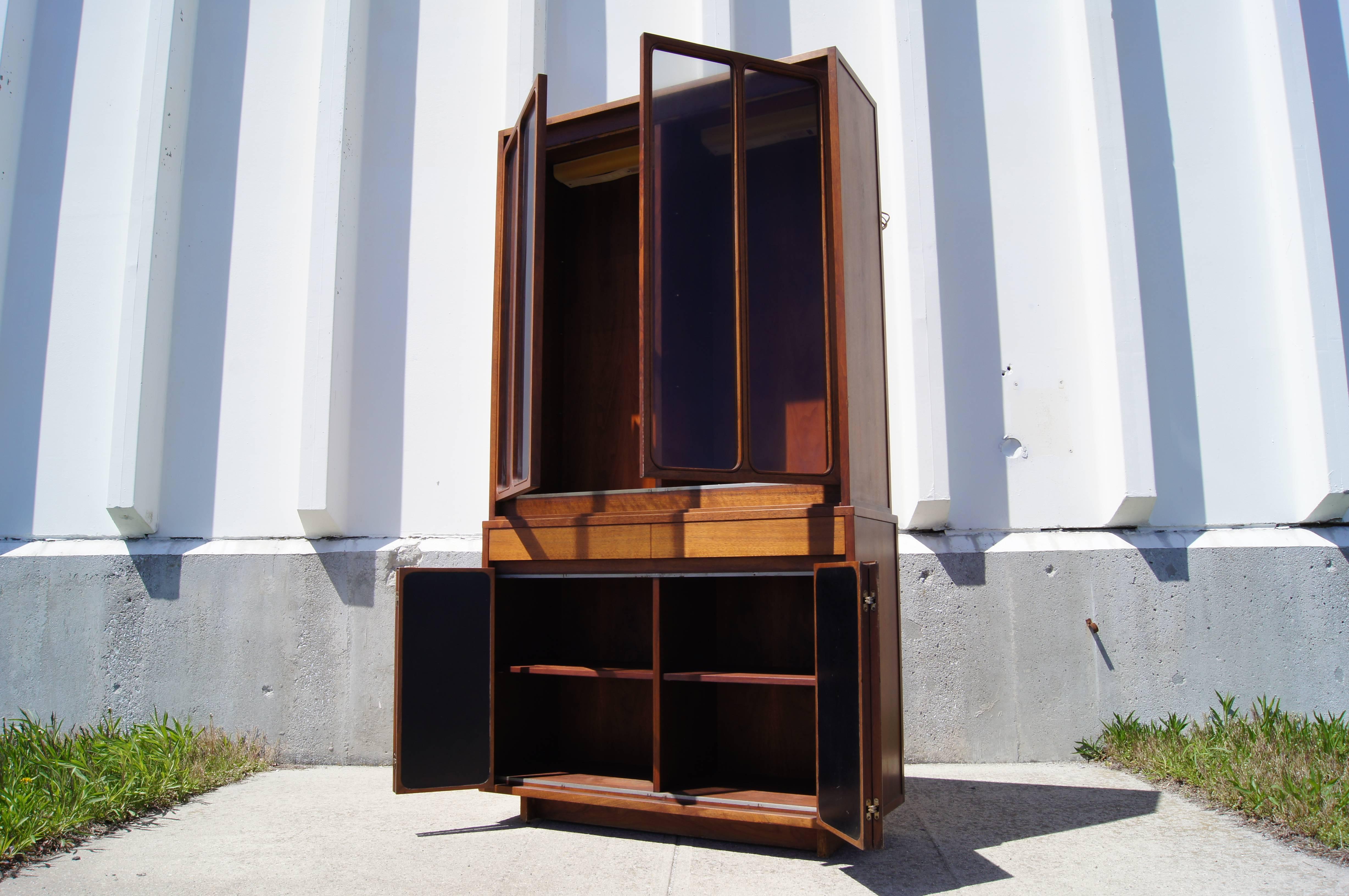 American Tall Walnut and Leather Cabinet with Glass Doors by Paul McCobb for H. Sacks For Sale