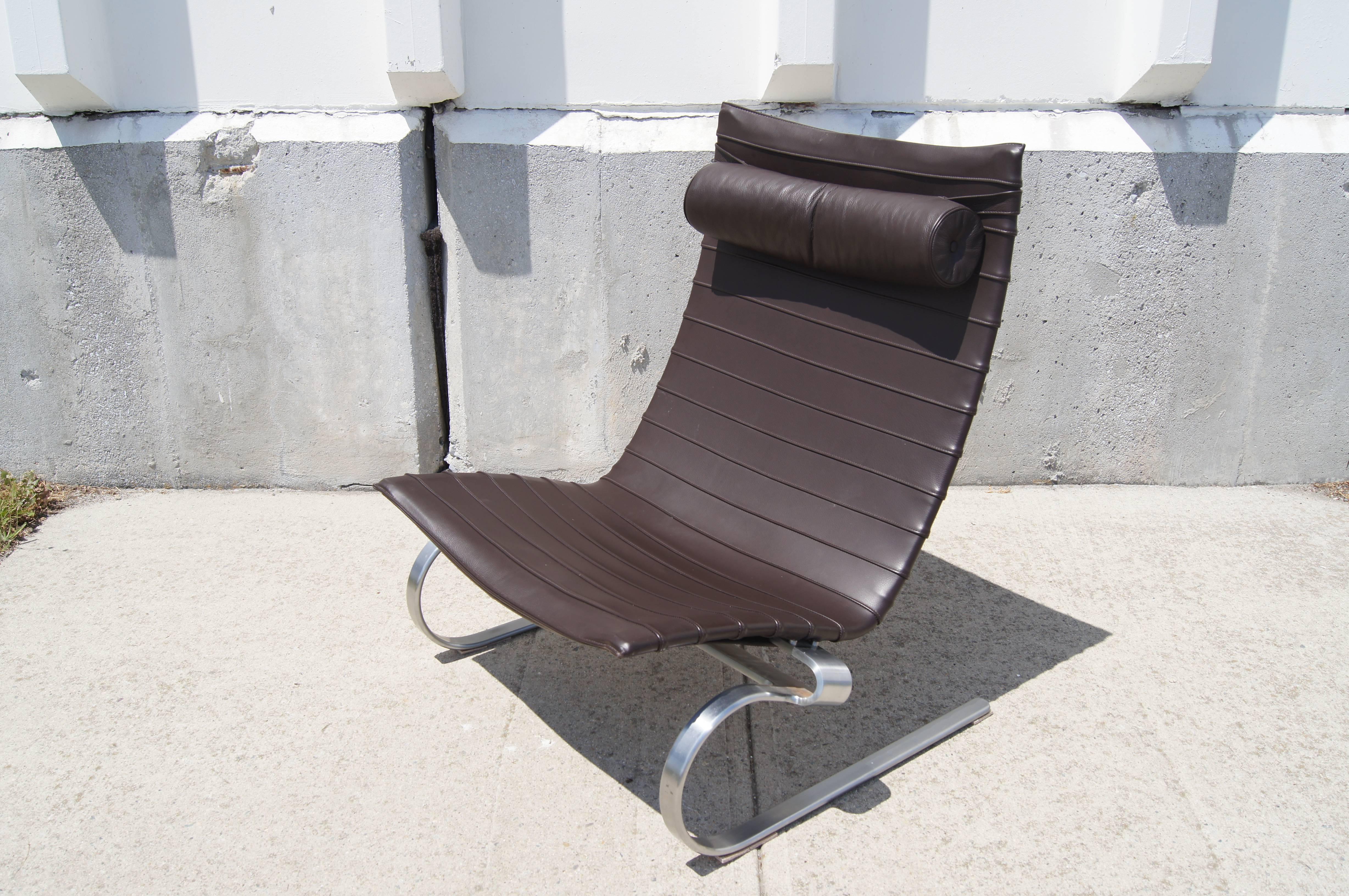 Designed in 1967 by Poul Kjaerholm and later produced by Fritz Hansen, the PK20 is an elegantly comfortable lounge chair. Sitting on base of flexible matte chromed steel is a generous high-backed seat with matching headrest. This chair is