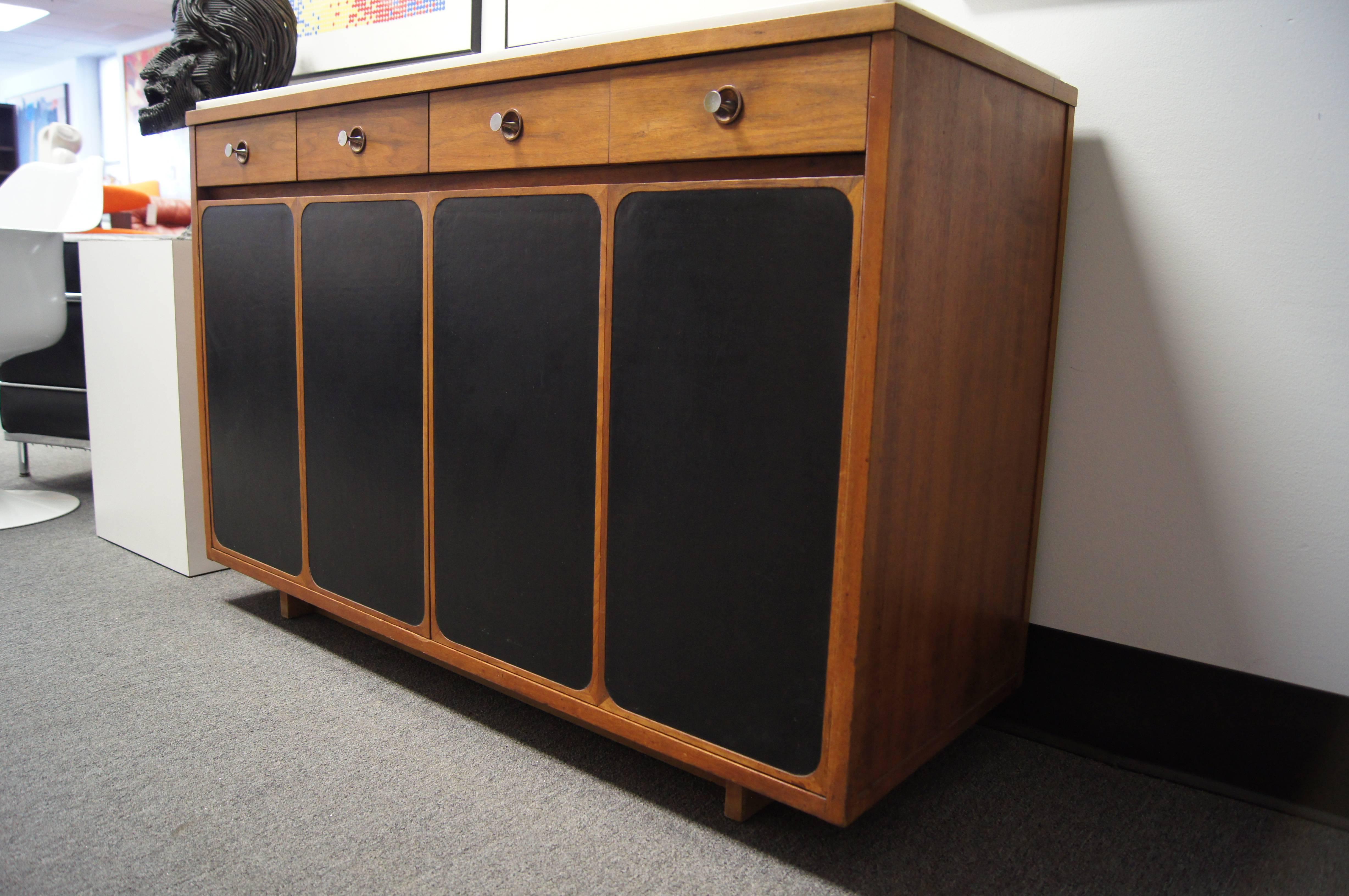 Mid-Century Modern Small Walnut Sideboard with White Marble Top and Leather Panels by Paul McCobb