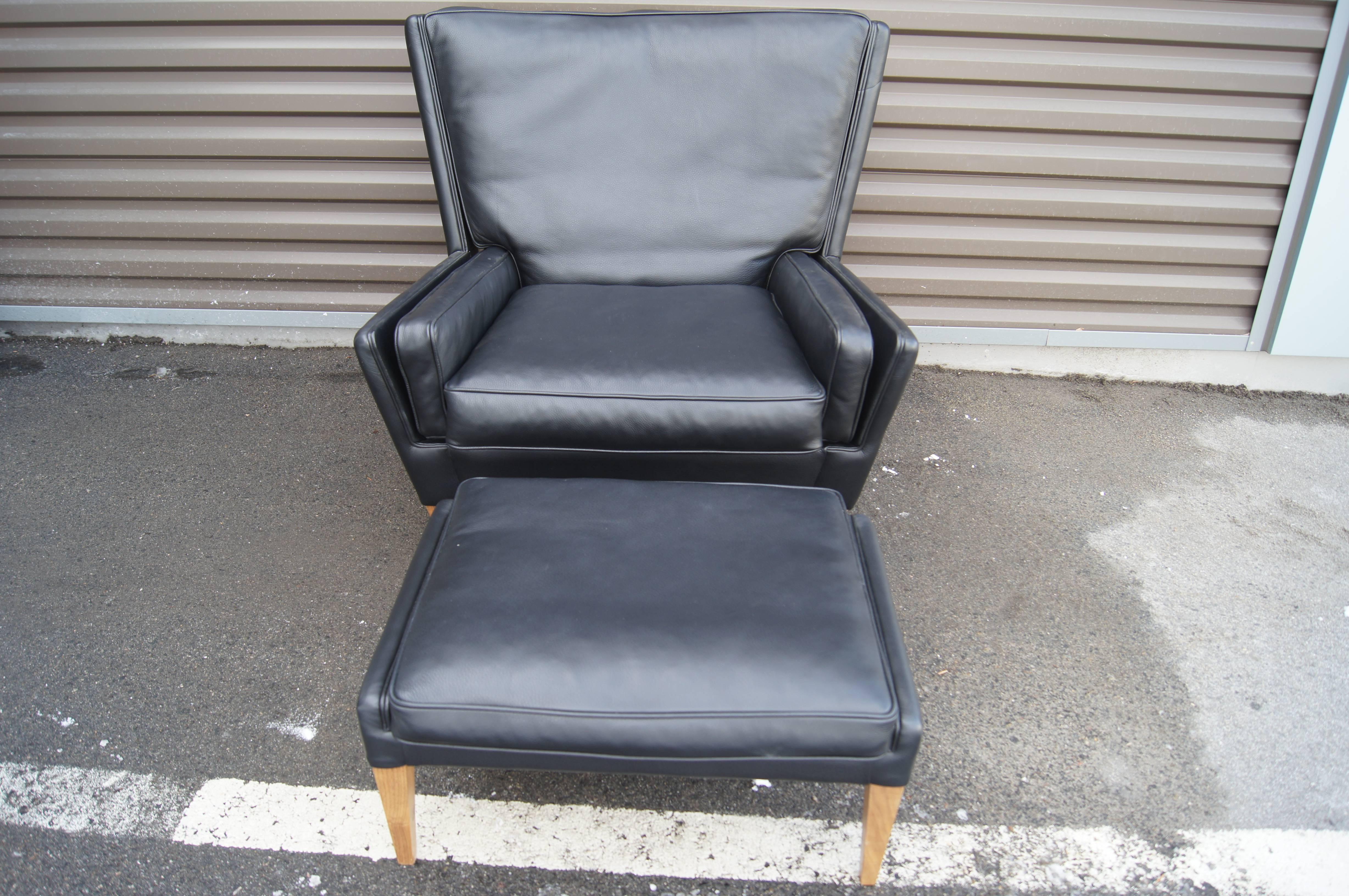 Black Leather Lounge Chair and Ottoman, Model V11, by Illum Wikkelsø In Excellent Condition In Dorchester, MA