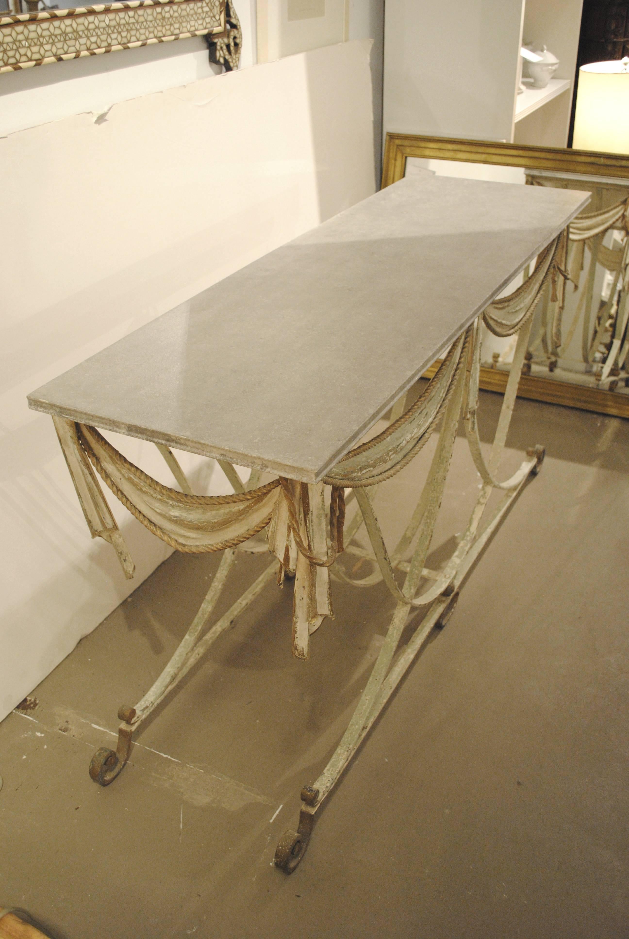 Painted iron and tole console, France, circa 1940.
   