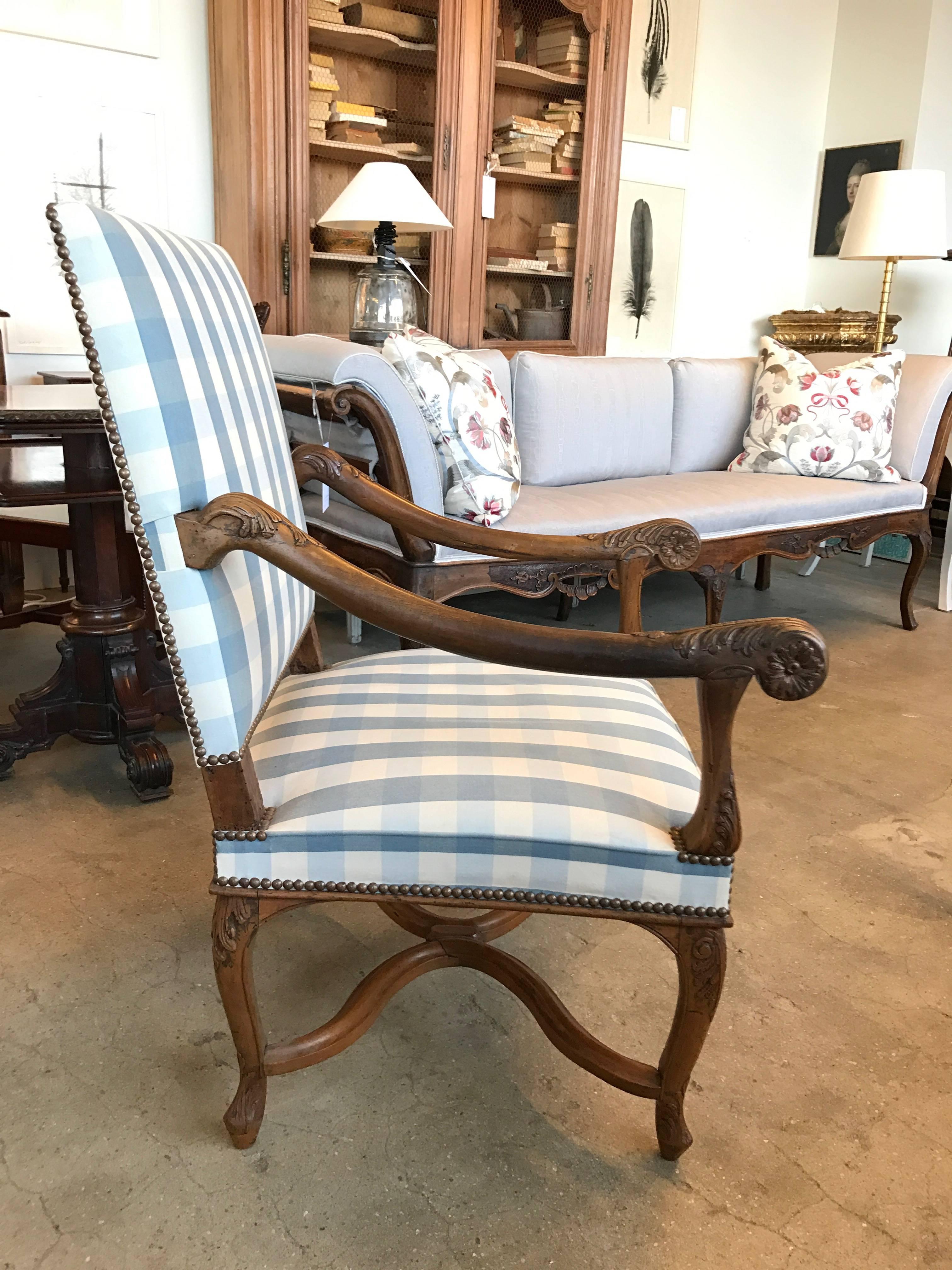 19th century French walnut armchair with blue and white check fabric.