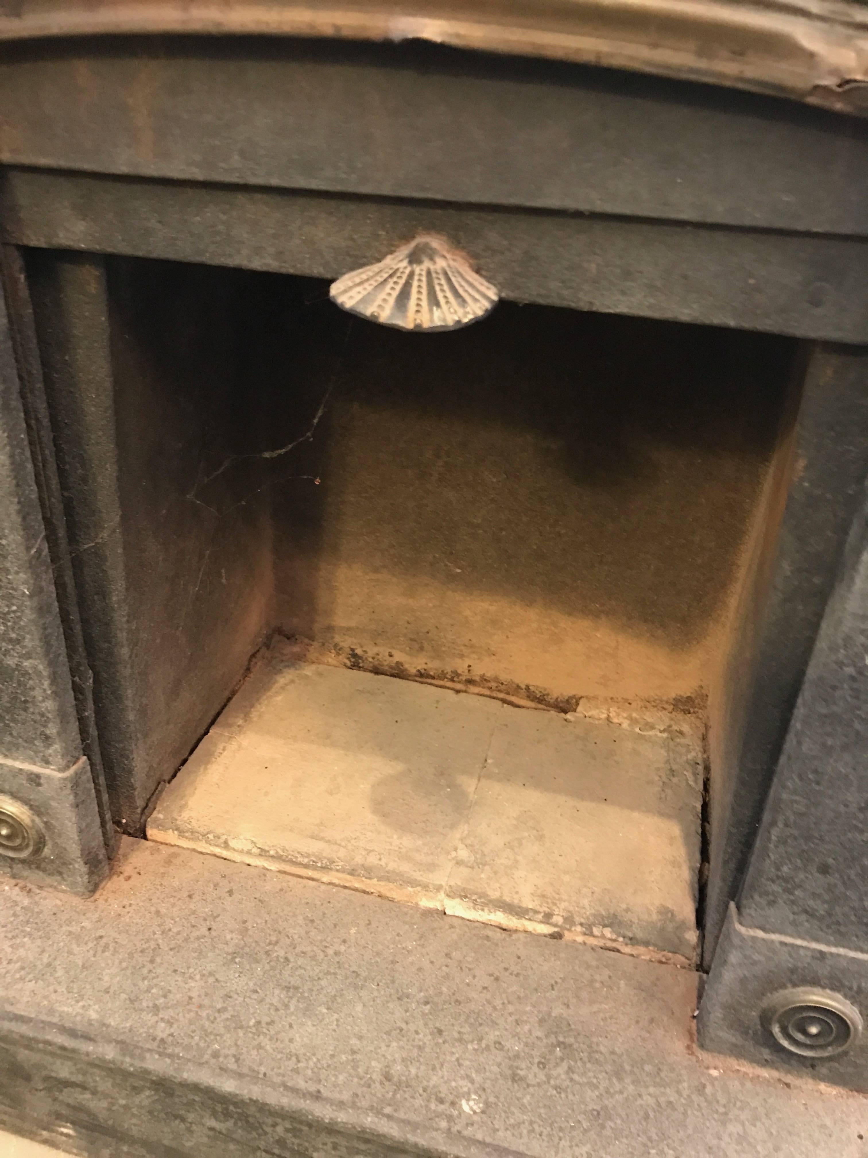 Early 19th Century Iron Wood Burning Corner Stove In Good Condition For Sale In Boston, MA