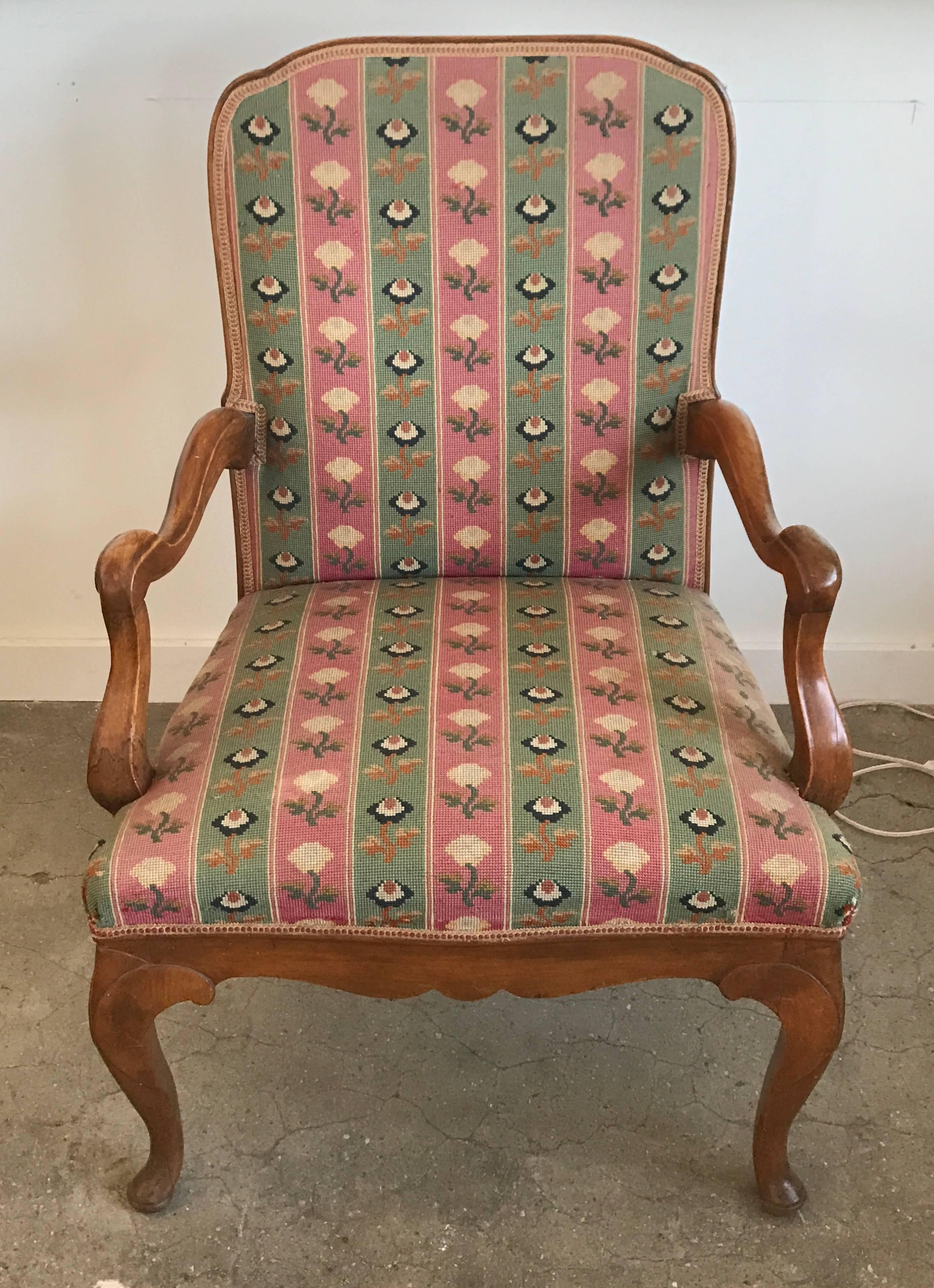 19th century fruitwood armchair with upholstered seat and back.