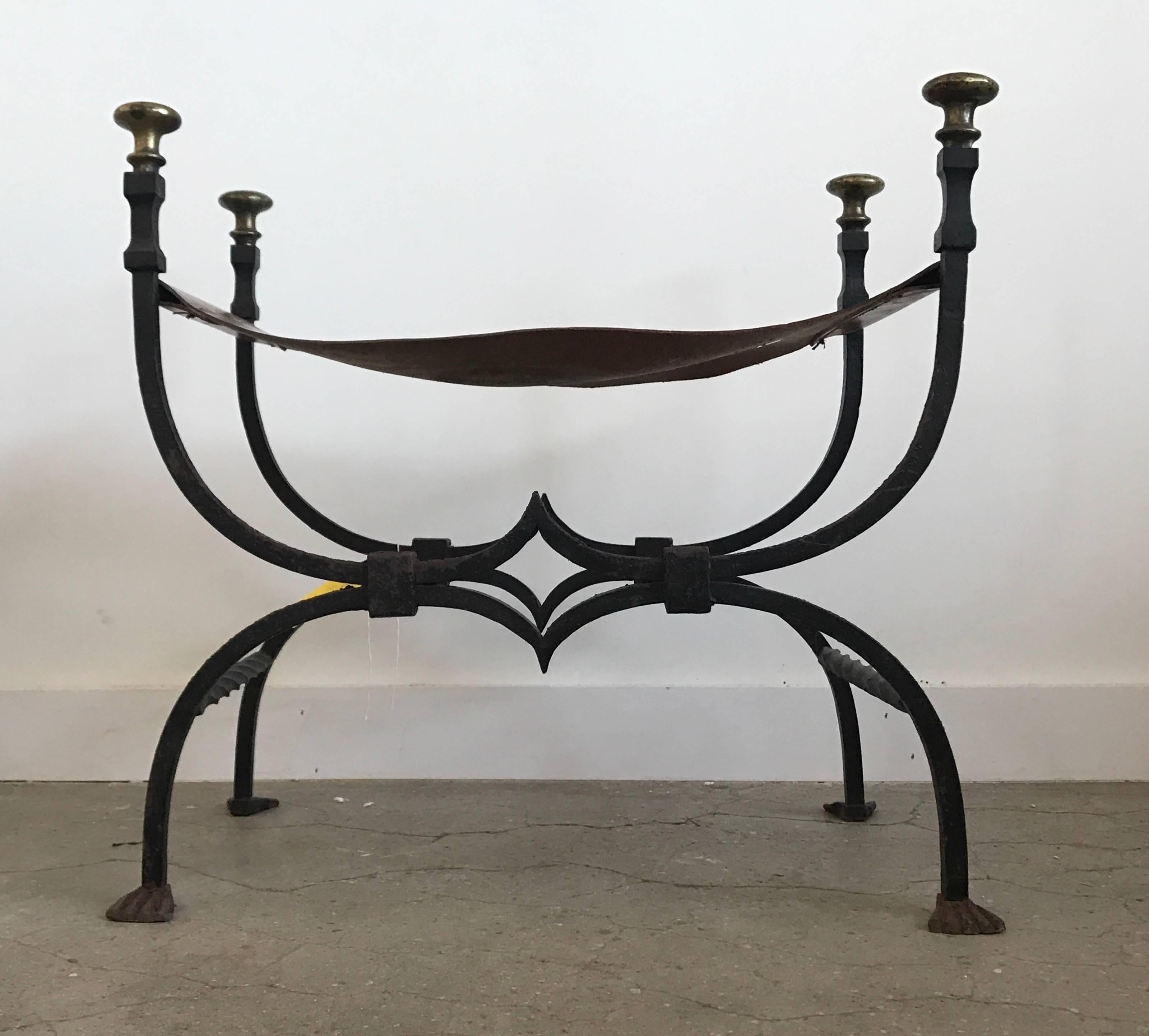 Pair of 19th century iron and leather benches.