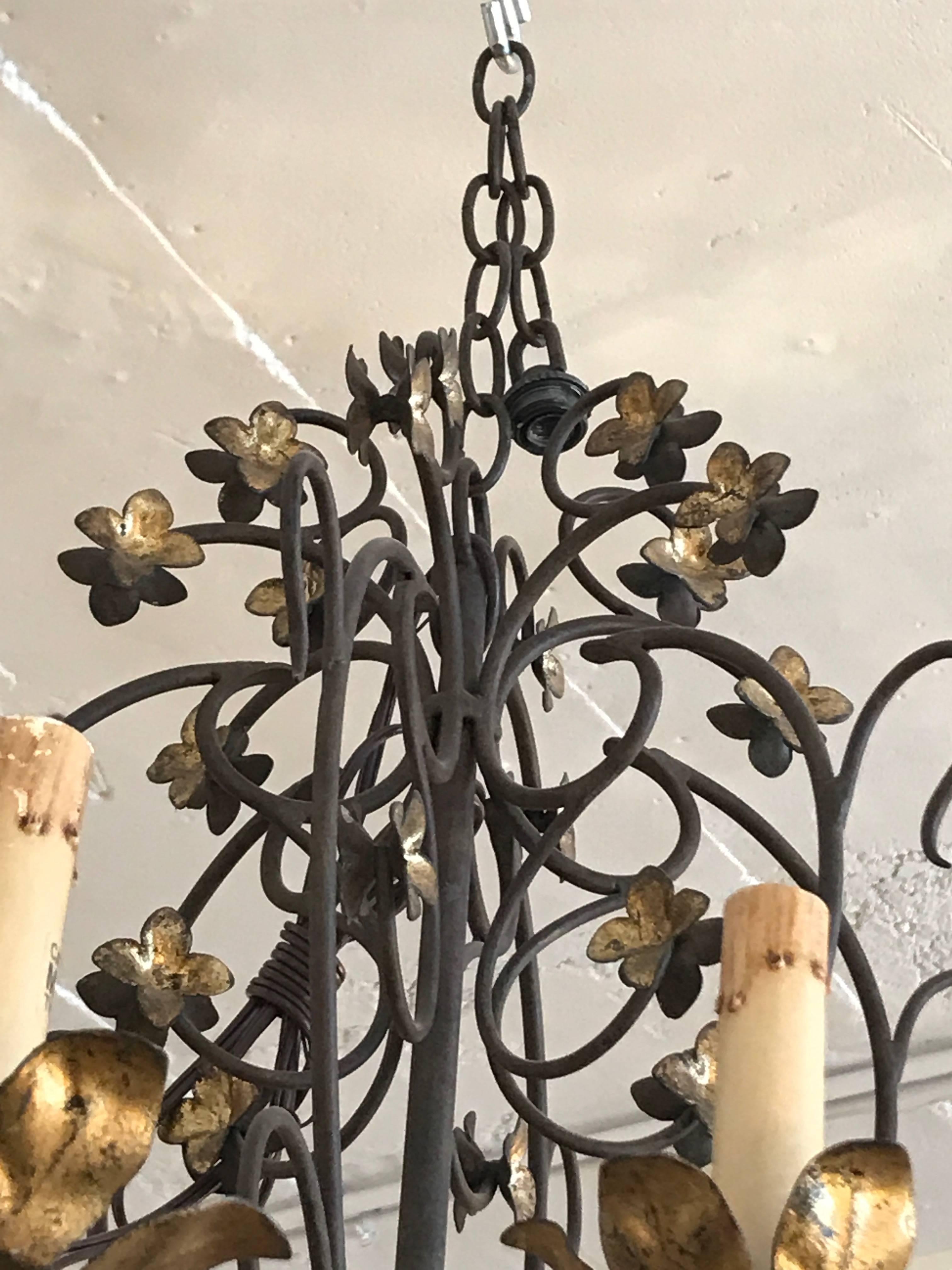 Gilded wrought iron chandelier.