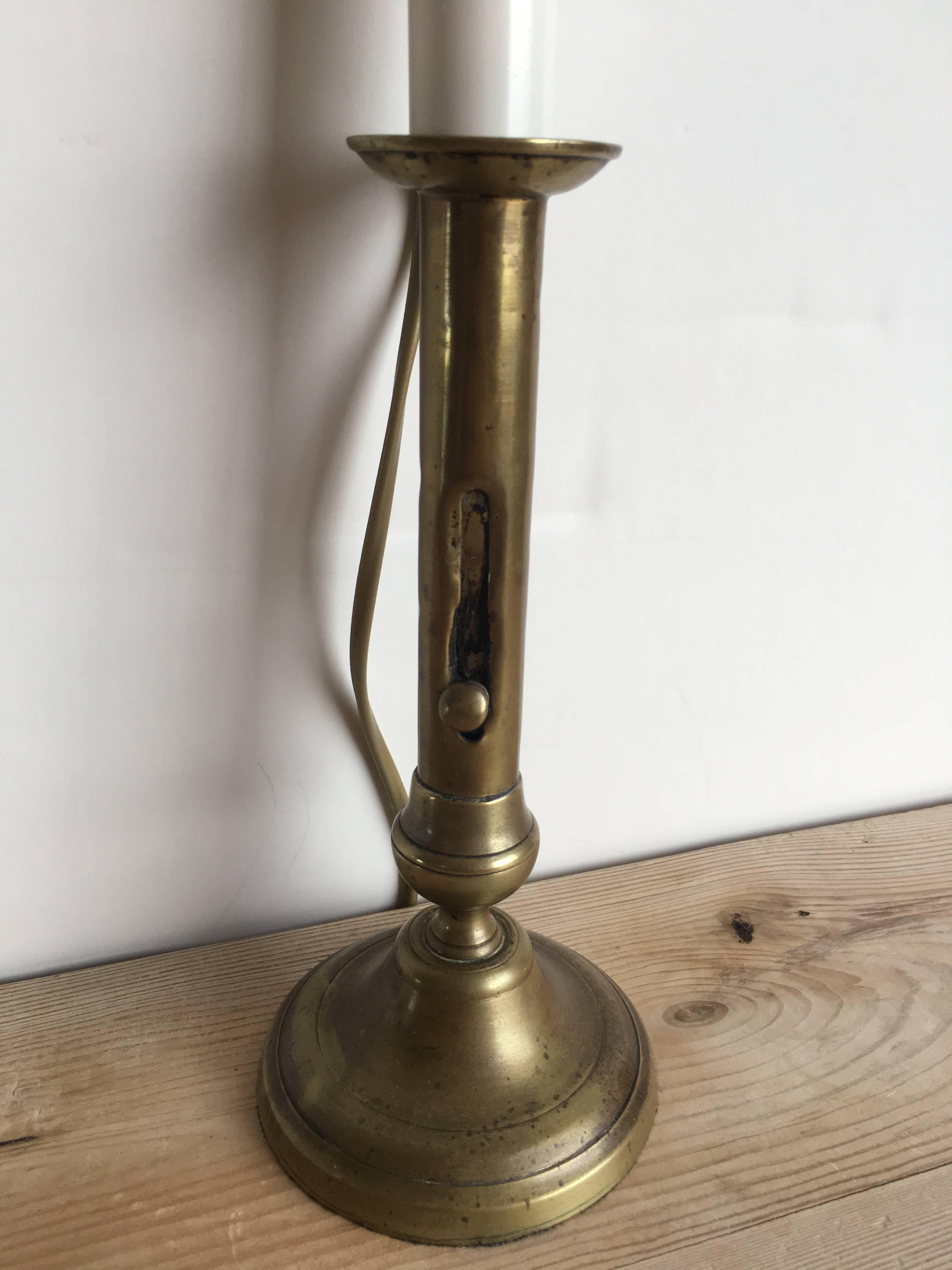 19th century brass candlestick lamp. Newly USA wired.
  