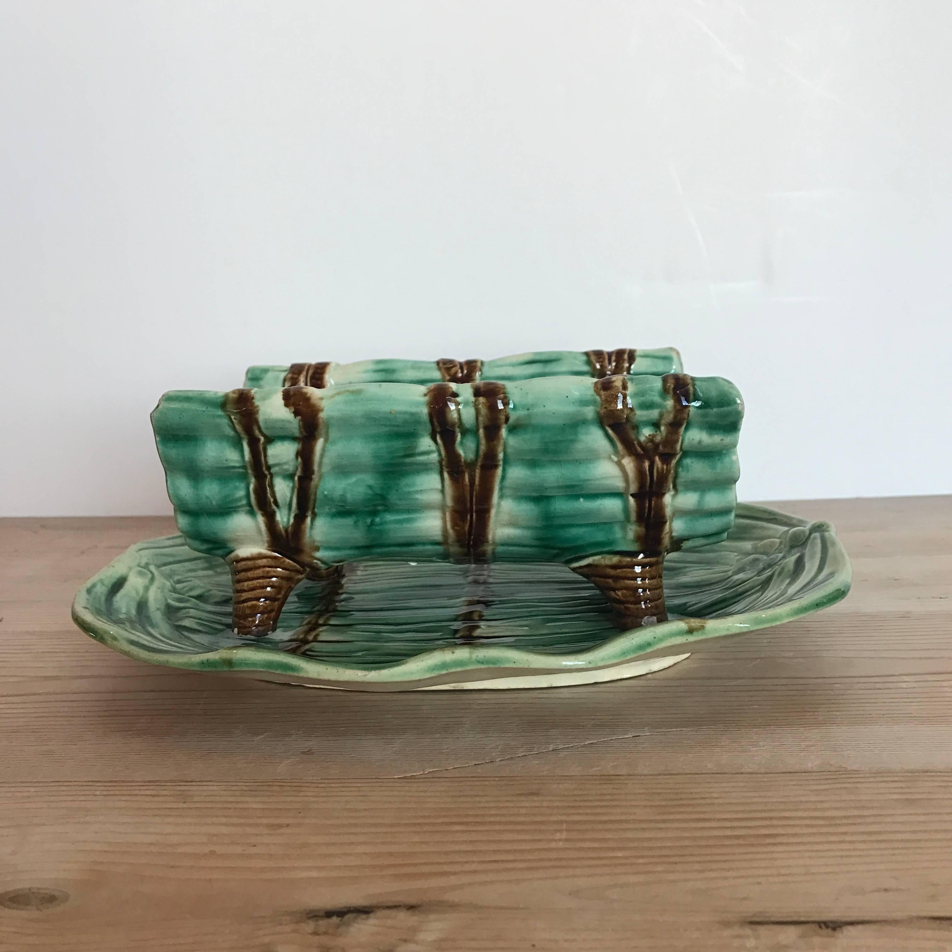 Majolica asparagus strainer and plate.