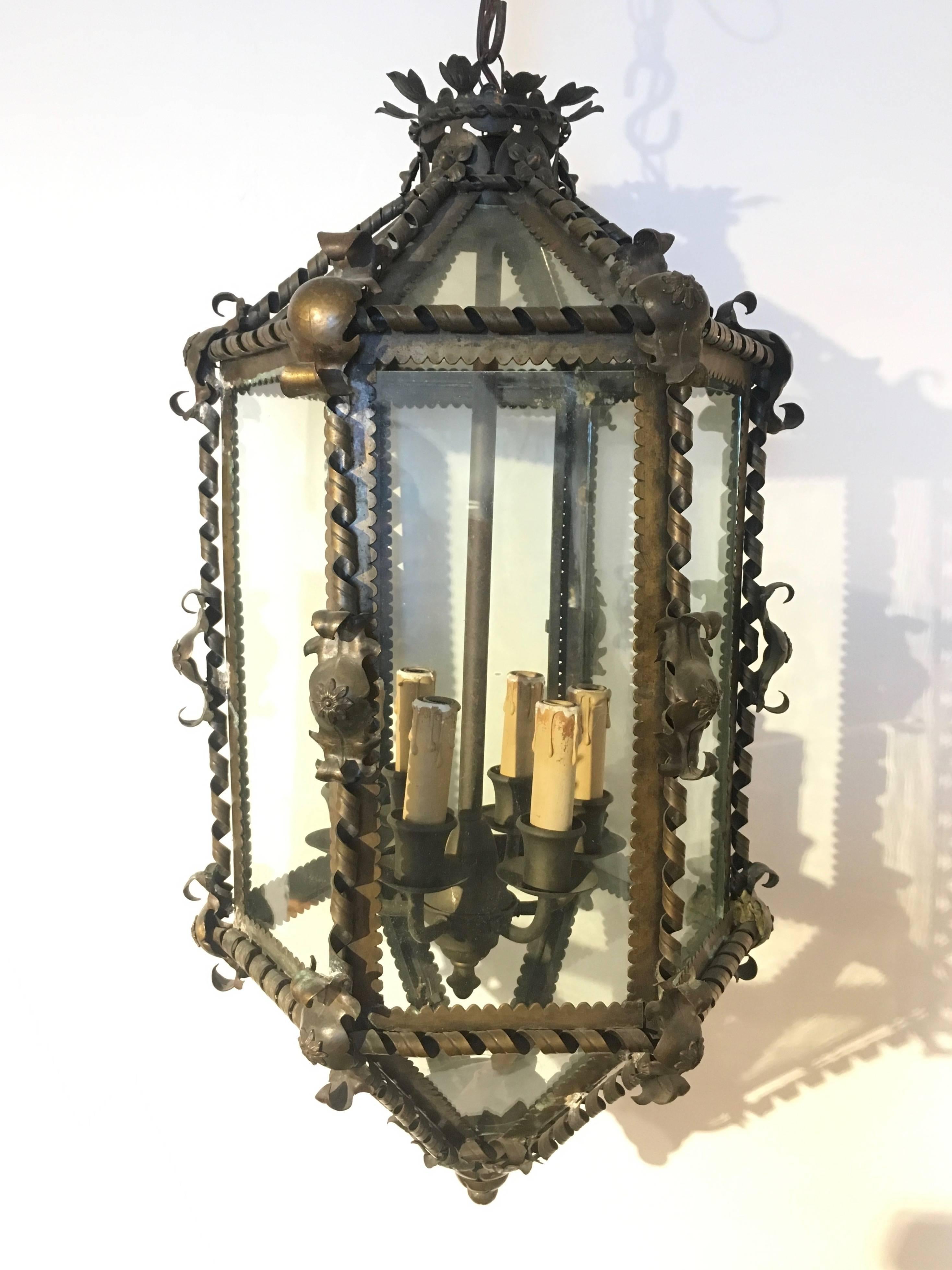 A wonderful French six-sided decorative lantern with elaborate scroll work and scalloped trim.