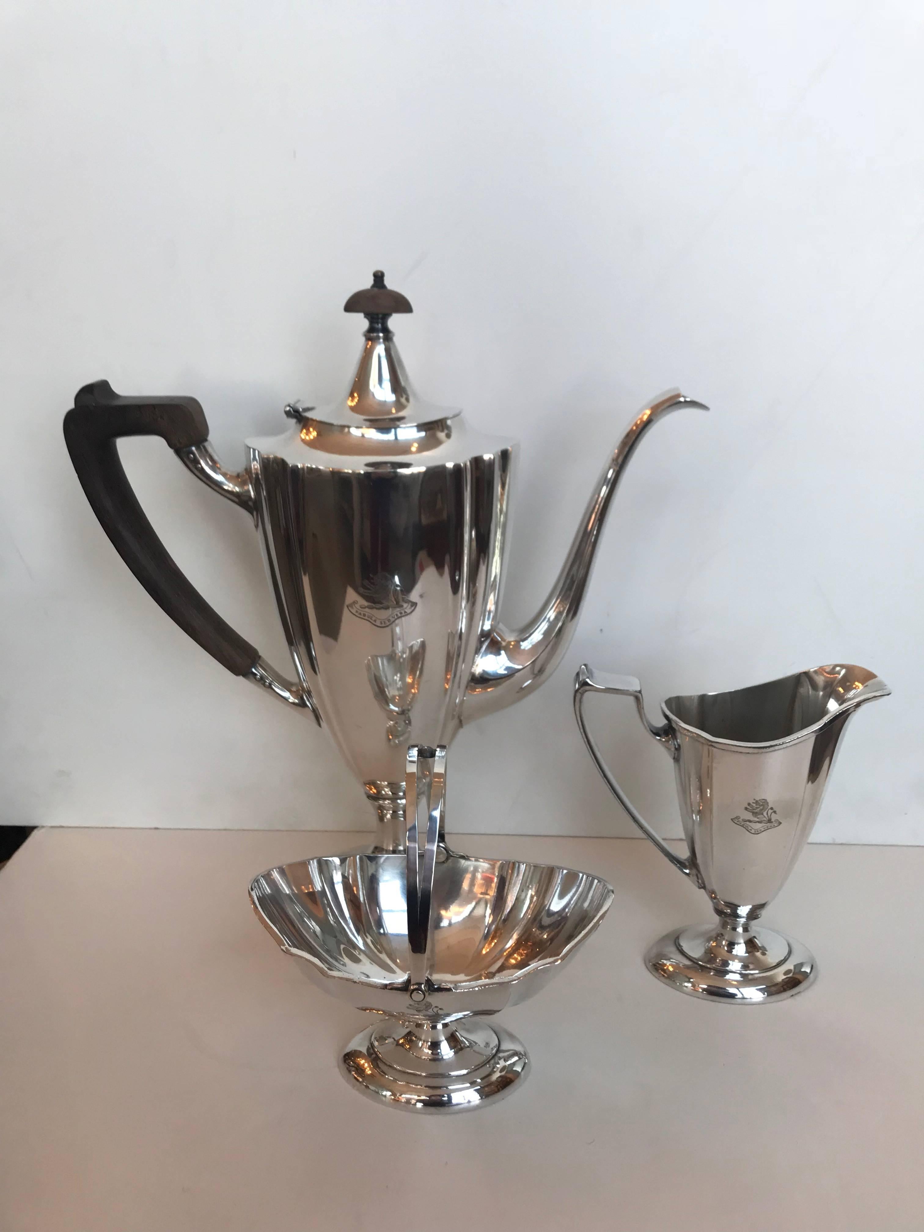 English silver plate tea service
Coffee pot: 10