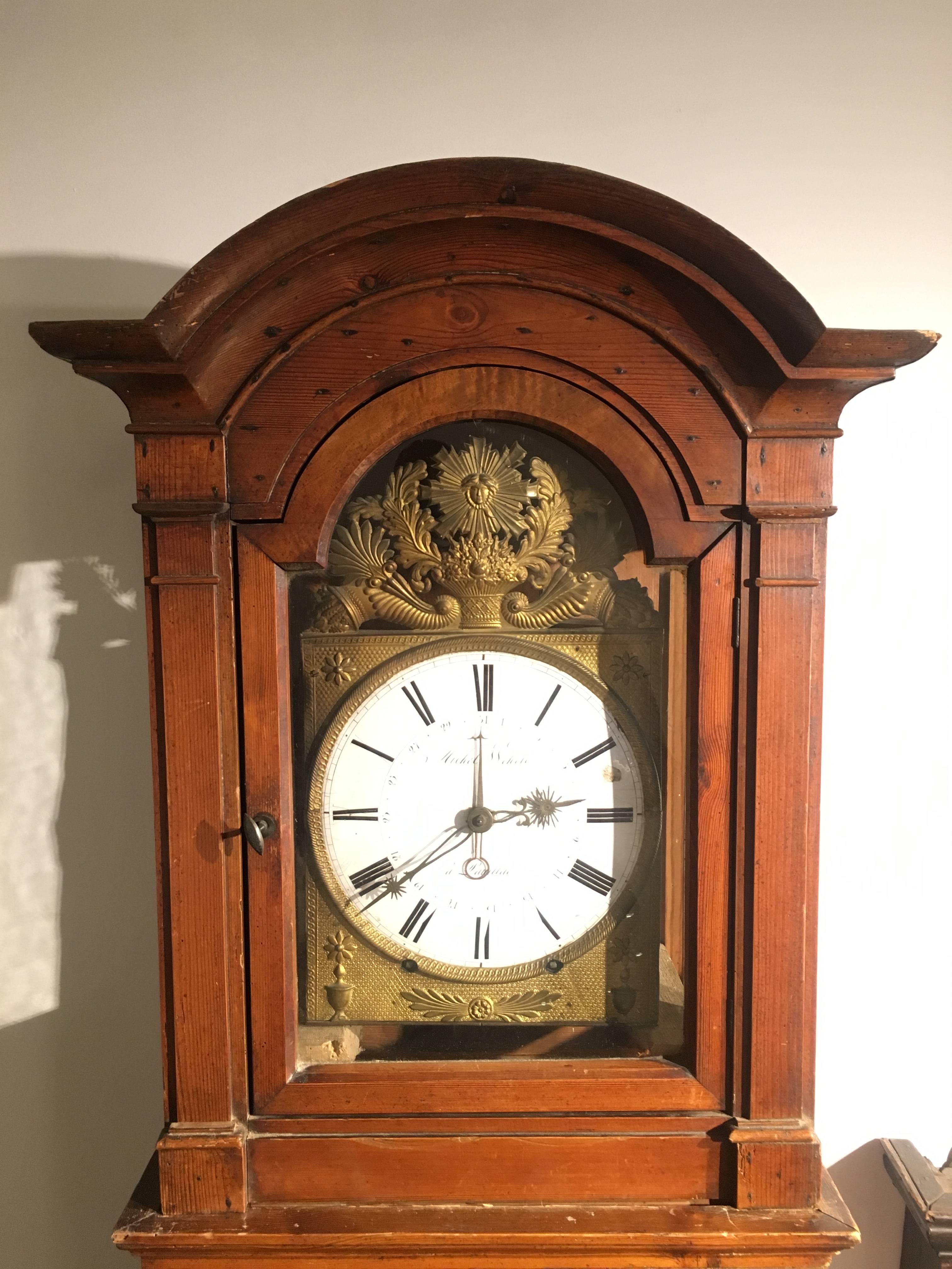 19th century, French red pine grandfather clock. In three parts. Glass door. With weights.