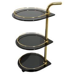 Rare three-tier Bar Cart in gold-tone metal and smoked glass 1970s made in Italy