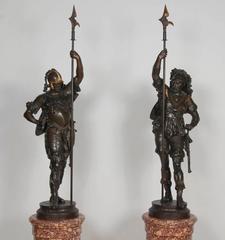 Pair of French Patinated Metal Figures of Warriors on Scagliola Pedestals