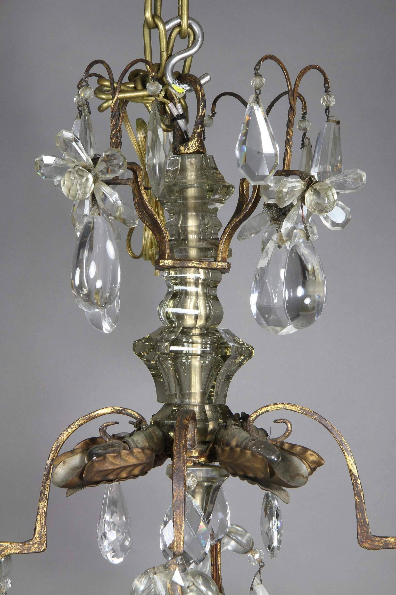French Louis XV Gilded Wrought Iron and Rock Crystal Chandelier For Sale