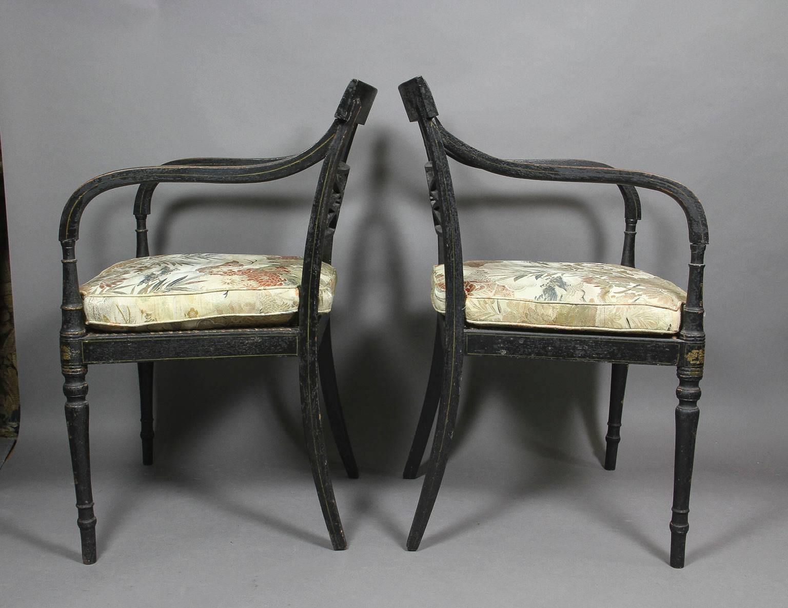 Early 19th Century Pair of Regency Ebonized and Gilded Armchairs