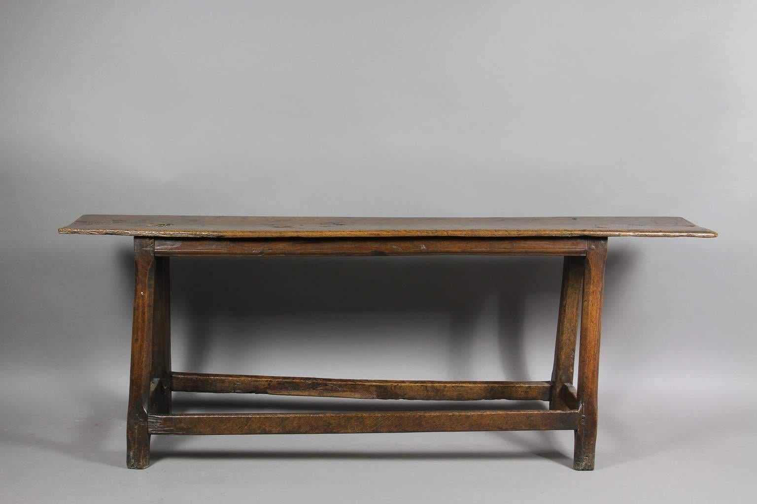 Rectangular seat and splayed legs and box stretcher