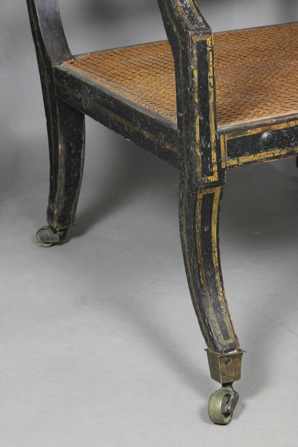 Pair of Regency Ebonized and Gilded Caned Armchairs 3