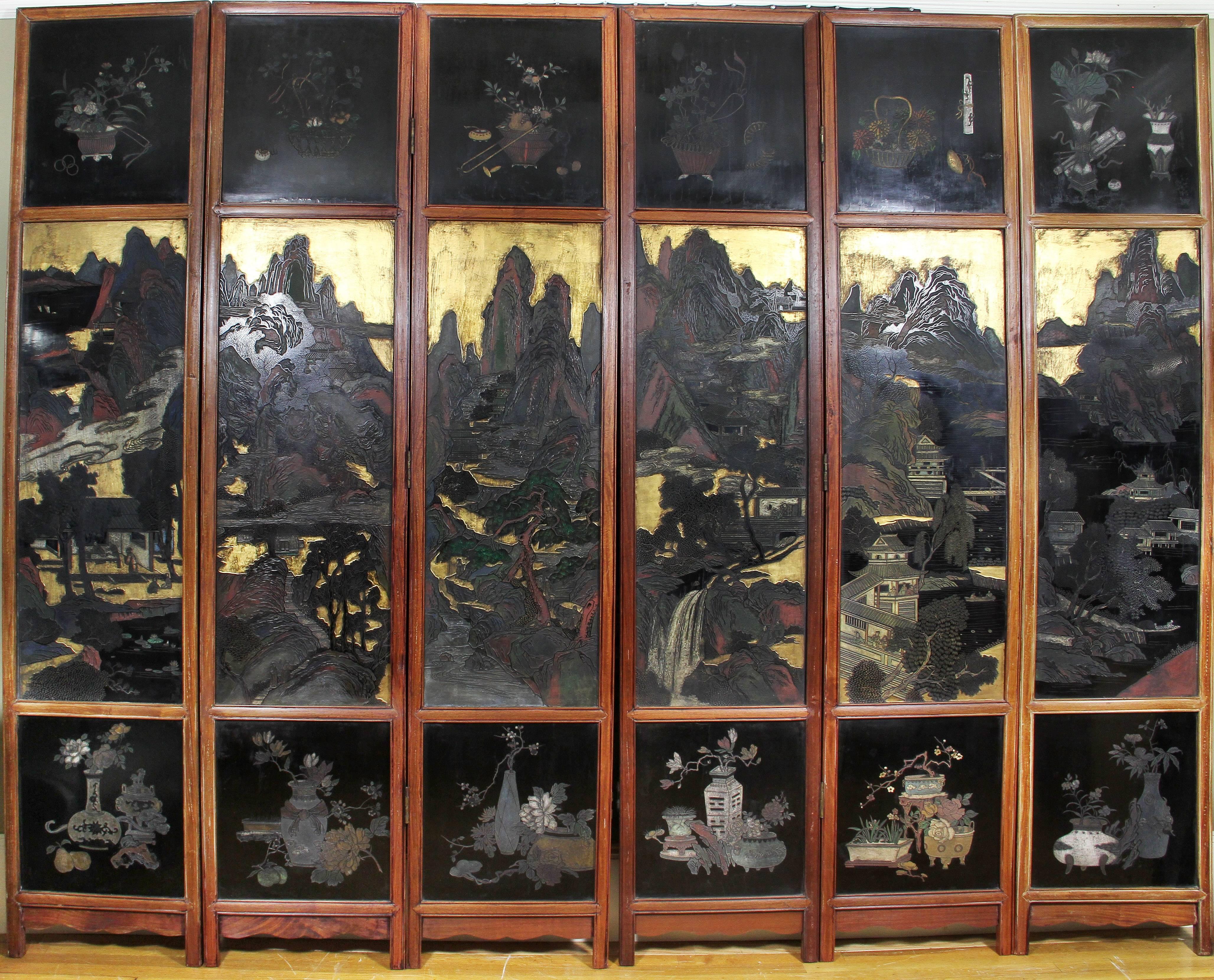 Double-sided with one side with scenes depicting court life, the back animal and floral scenes, each panel in a teakwood frame.