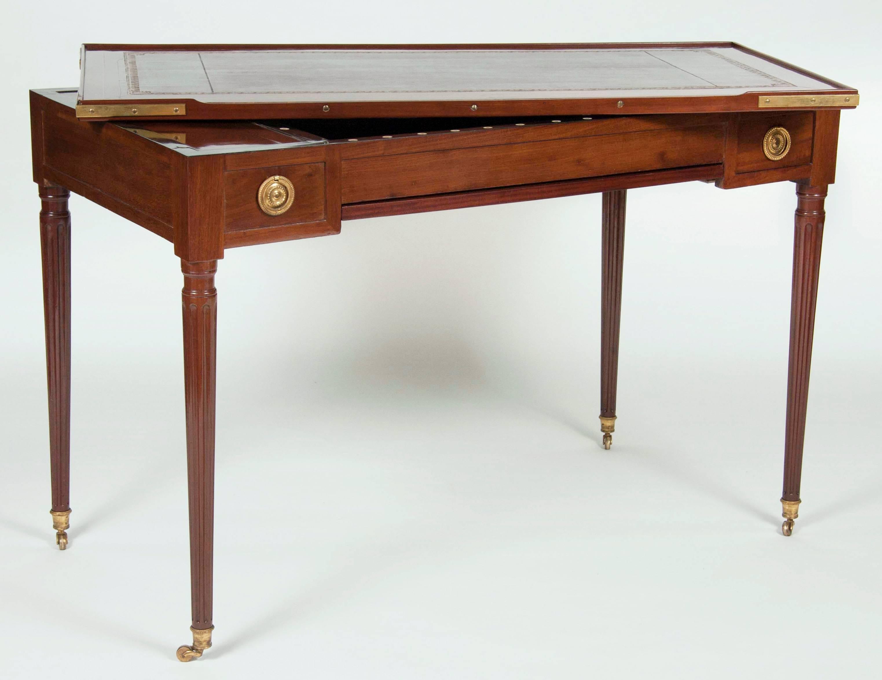 Stamped on base by maker Jean Louis Debierre, leather reversible top with baise on reverse, finely inlaid backgammon surface with game pieces and original silver plate candleholders, opposing drawers and lower slide out inlaid chess and on reverse