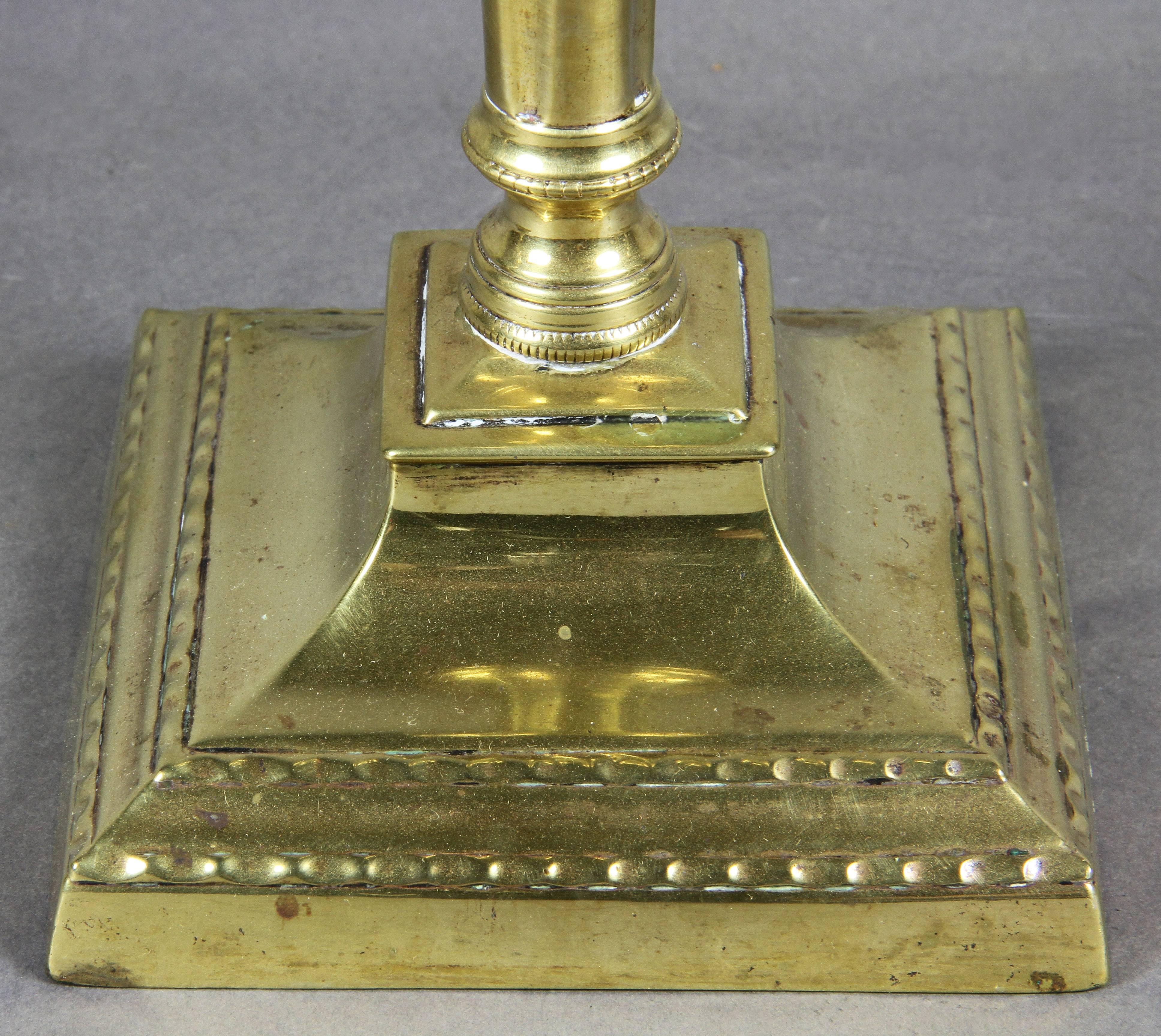 Late 18th Century Set of Four George III Brass Candlesticks