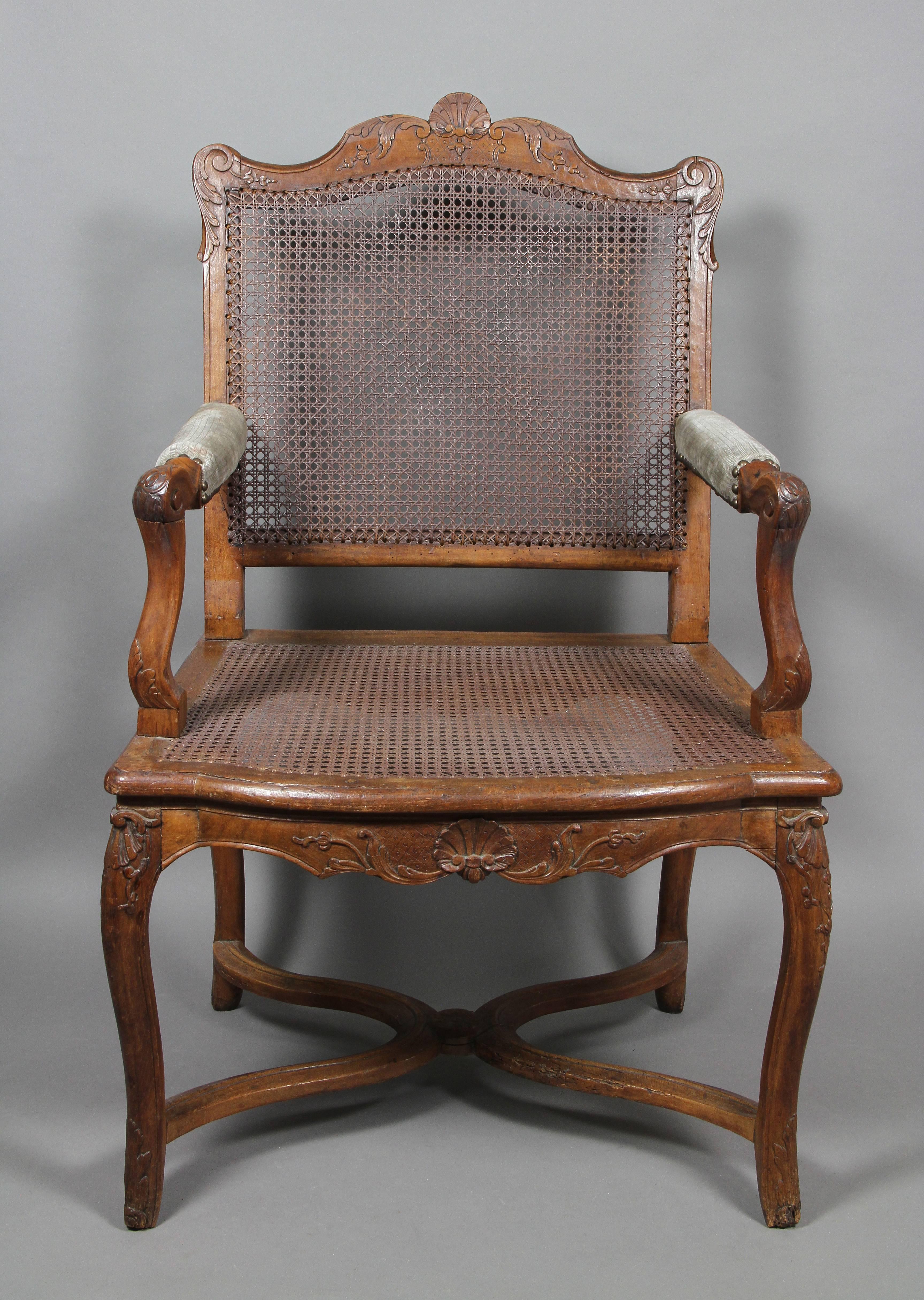 Mid-18th Century Regence Walnut and Caned Fauteuil/ Armchair For Sale
