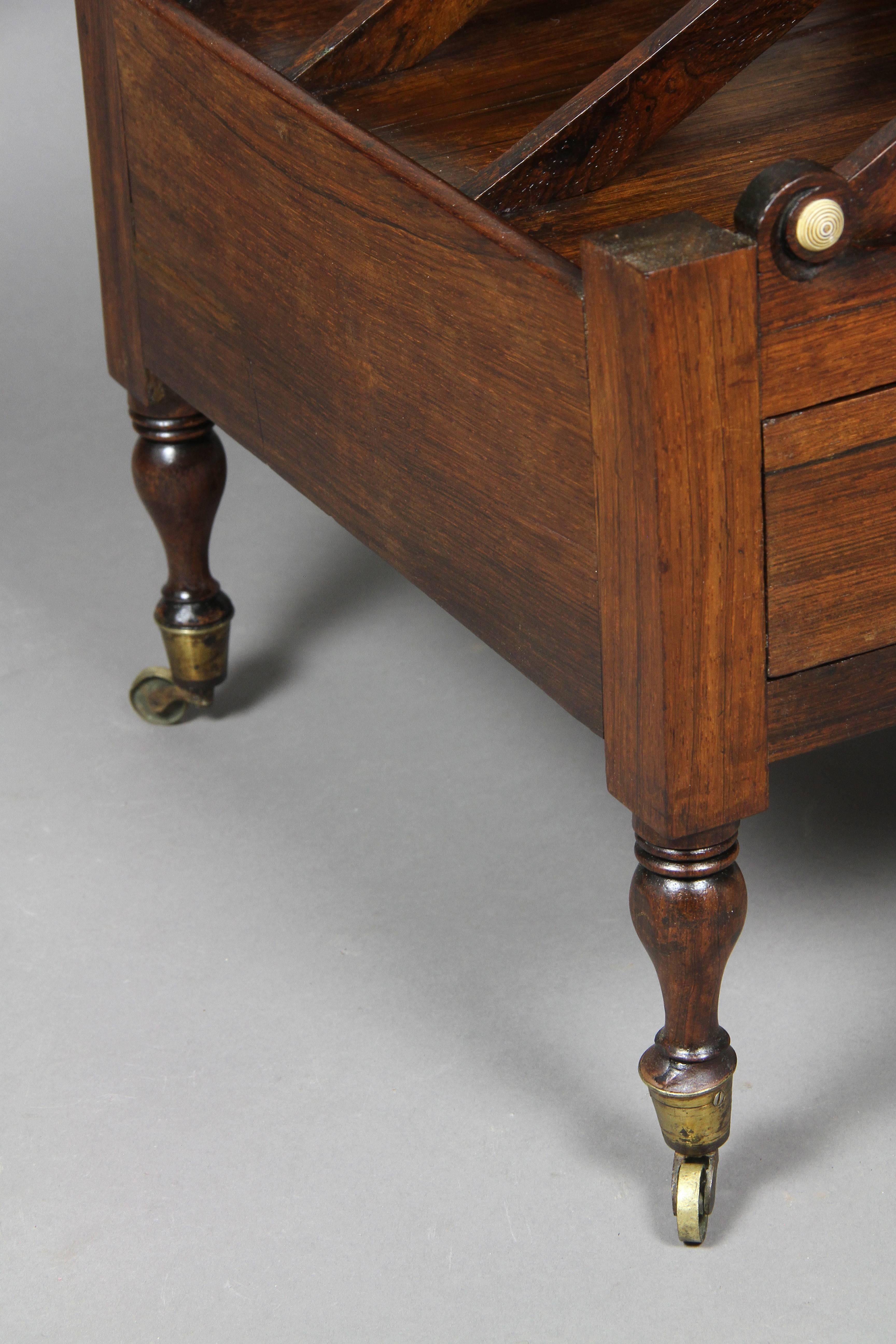 Rectangular with wreath carving, single drawer, raised on turned tapered legs with casters.