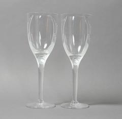 Satz von acht Lalique Champagnergläsern "Engelsmuster"