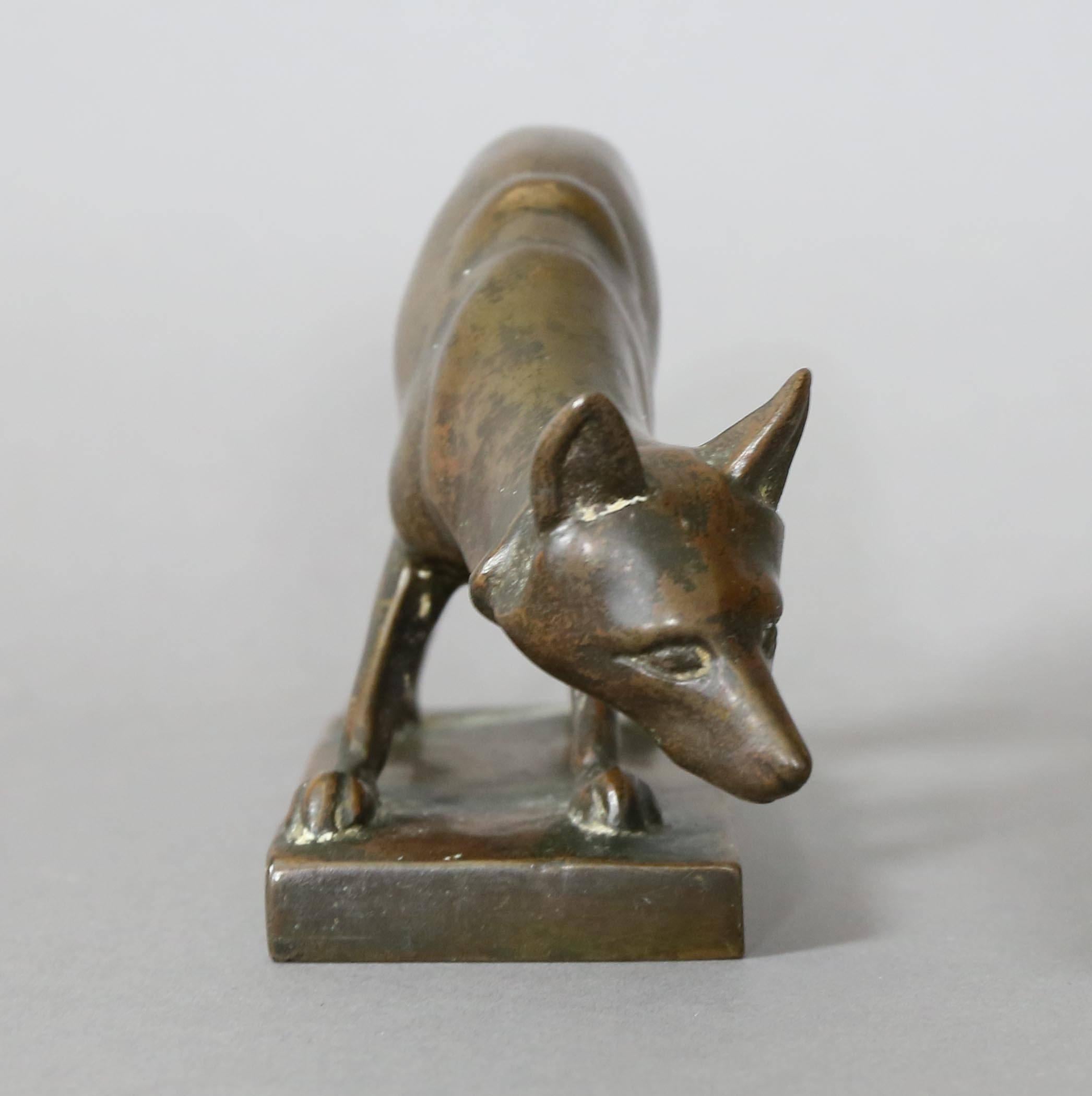 Crouching figure of a fox on a rectangular base. Signed Gorham Co, Founders, OGLM.
