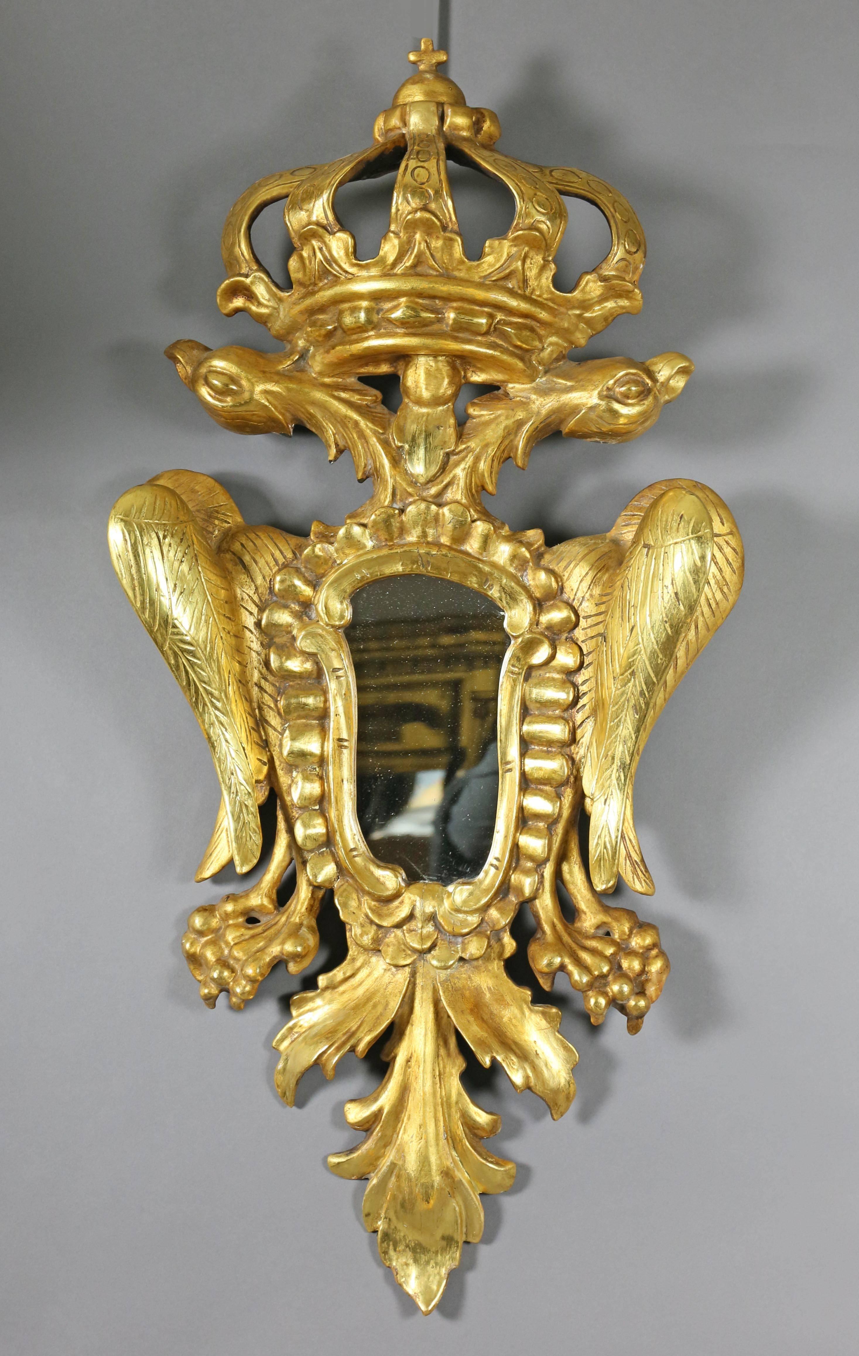 Each depicting two eagles beneath a crown, possibly Austrian or Russian.