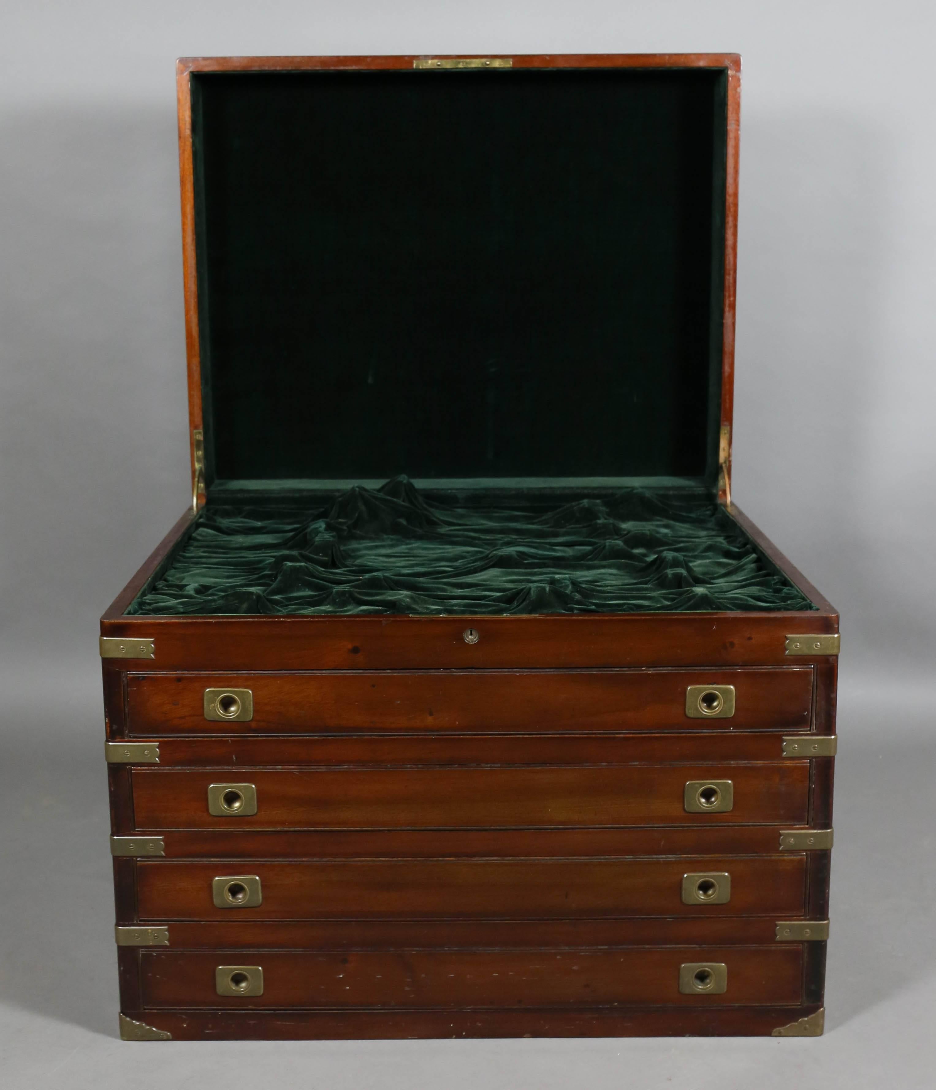 Velvet lined, with four drawers and brass details.