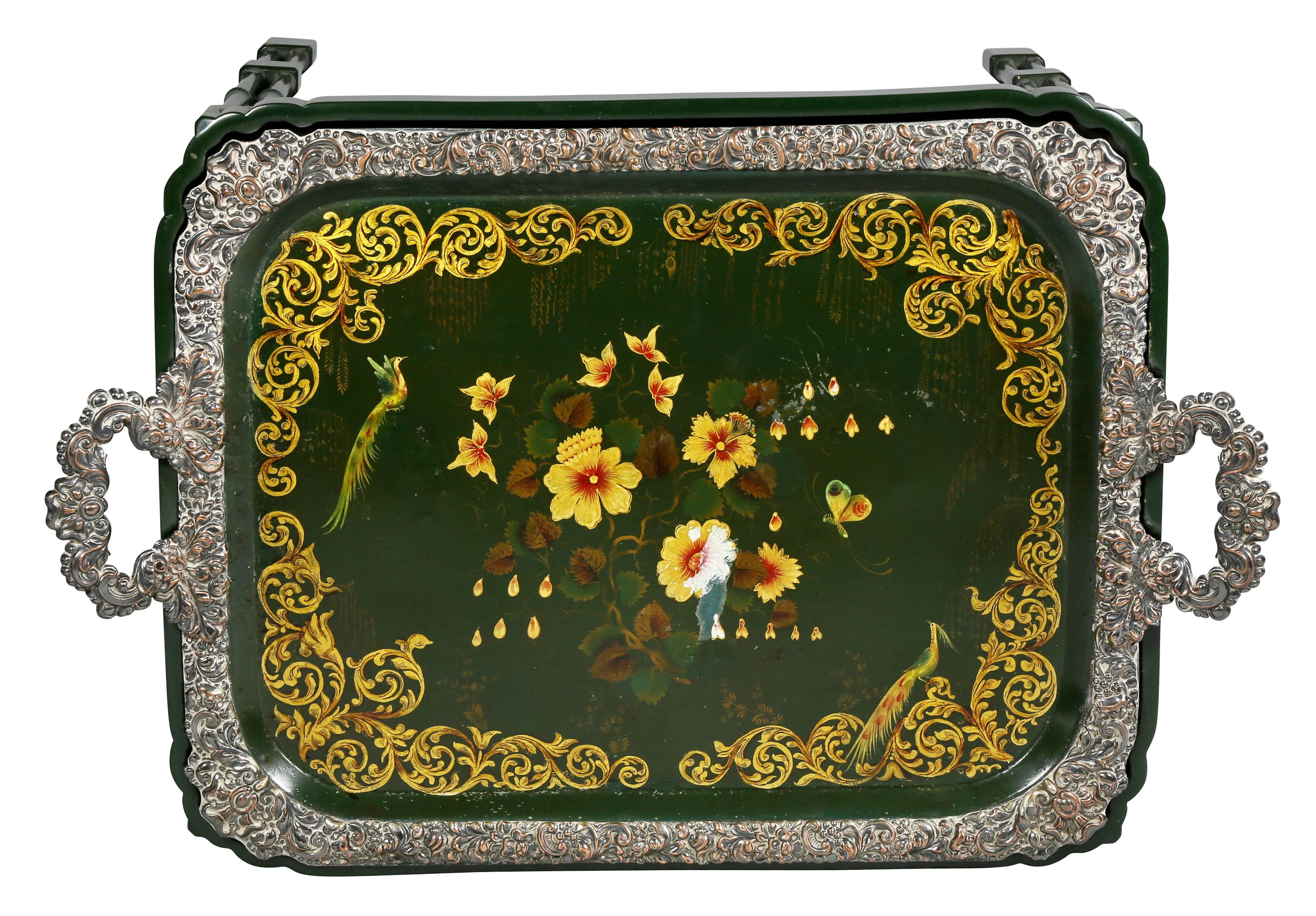 Rectangular tray with silver plate border and central floral decoration raised on a faux bamboo base with pierced X form stretchers.