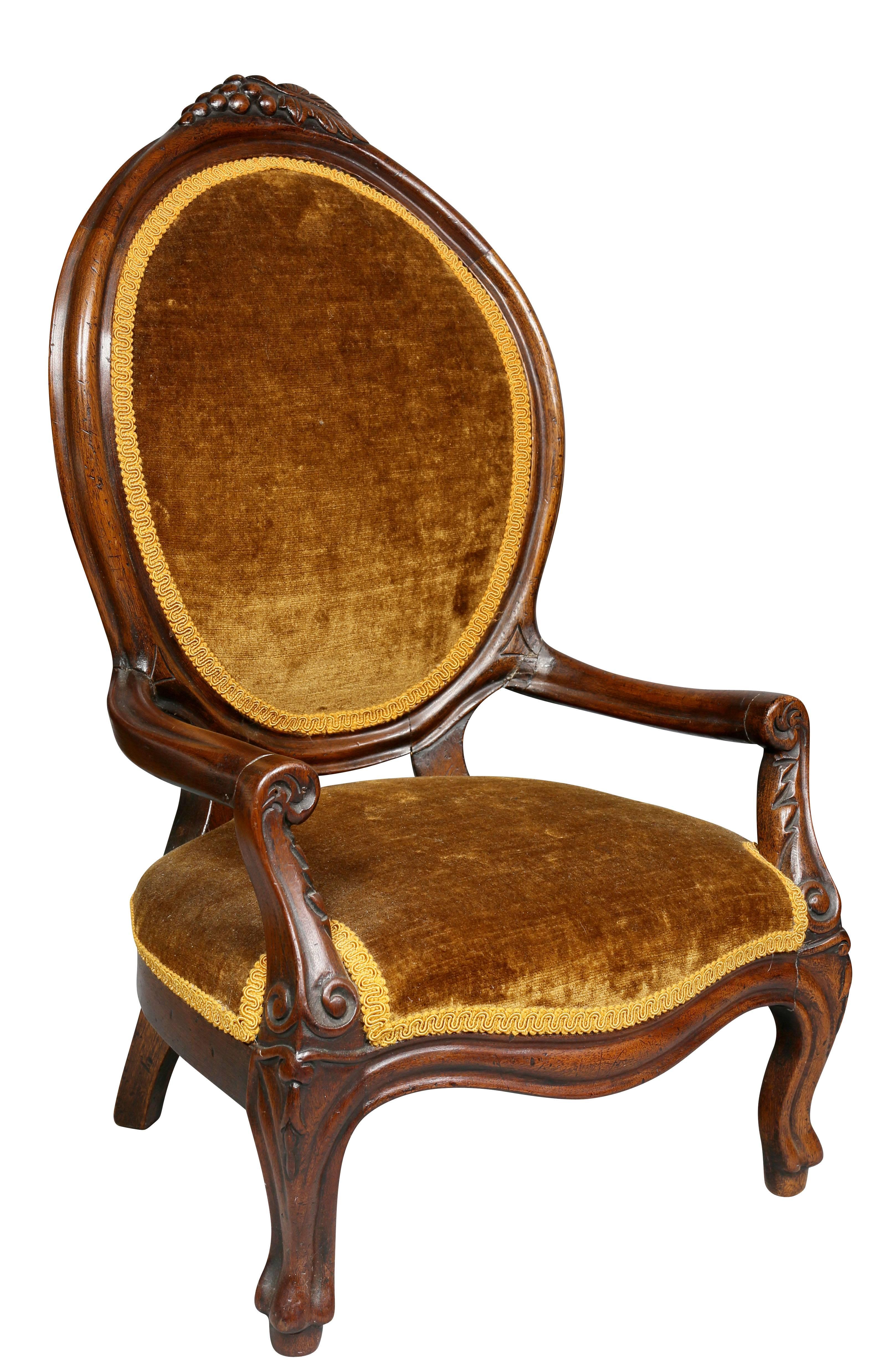 Comprised of a settee, armchair and side chair. Rococo Revival style.