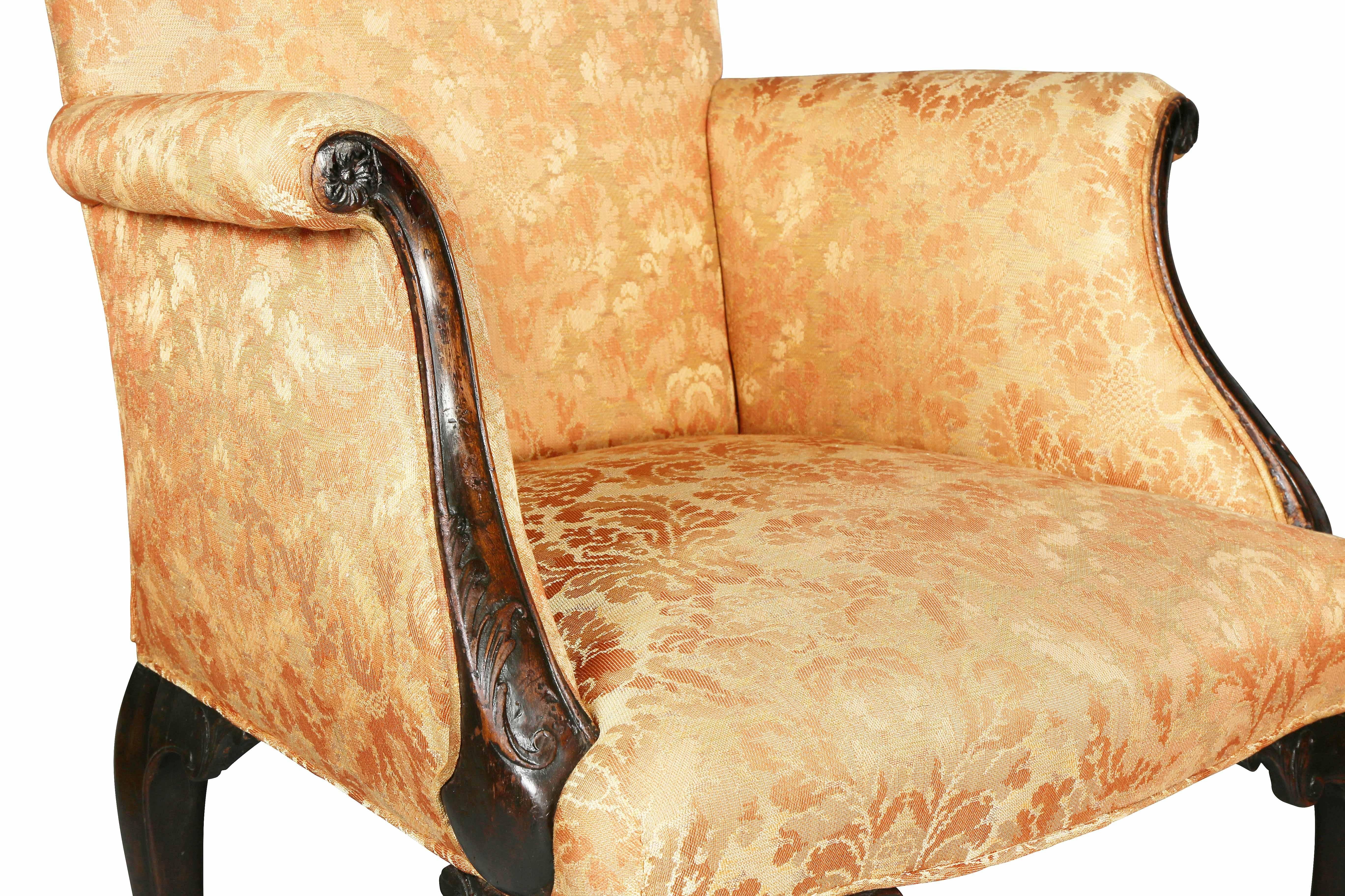 With a serpentine upholstered back and seat raised on cabriole legs with cabouchon and scroll carving ending on scroll feet. Provenance: Arthur Ackerman and Son, NYC. Purchased June 22, 1962.
