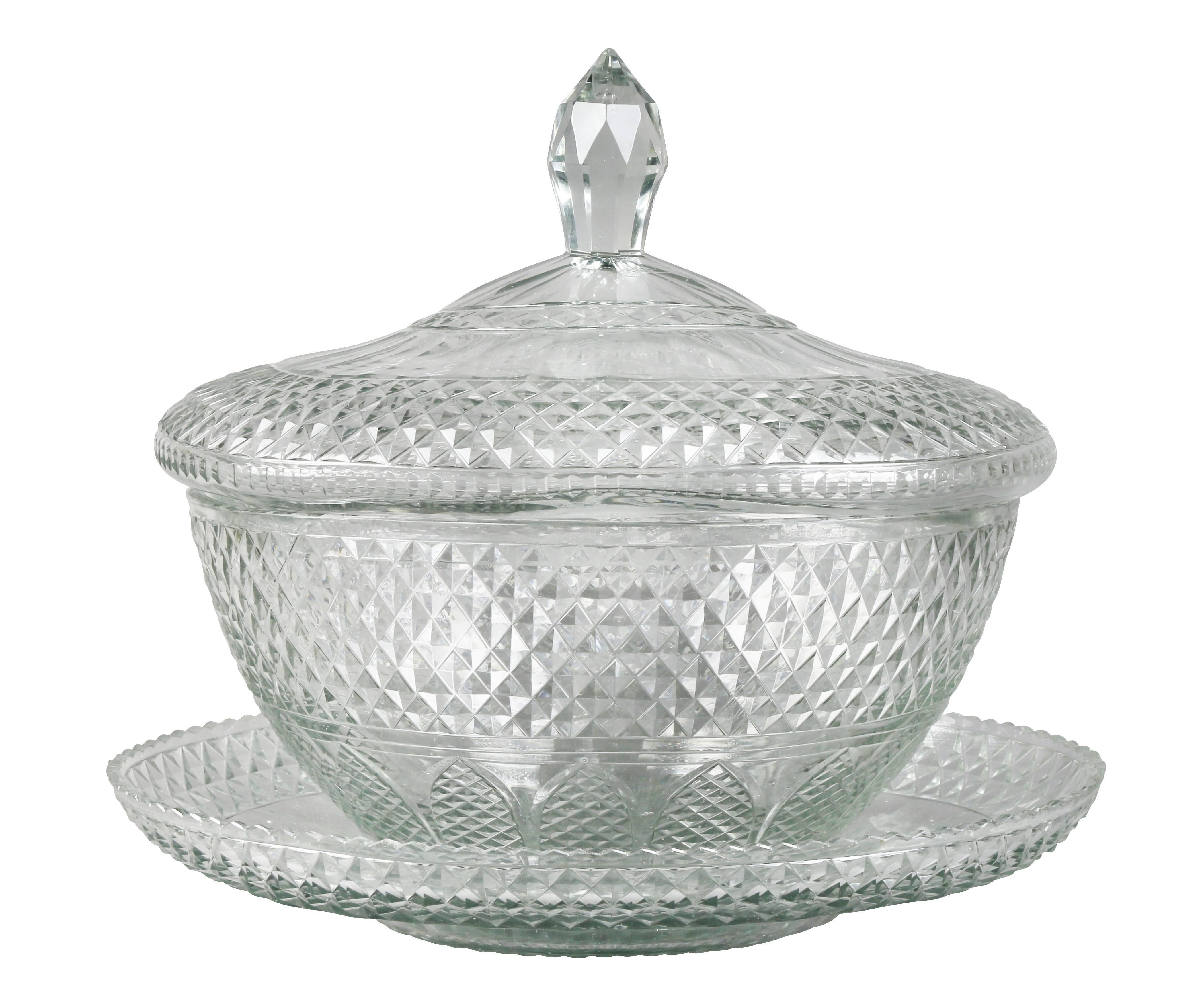 With domed cover with cut diamond cut finial, bowl section with conforming diamond cut and matching underplate. Flaws in making.