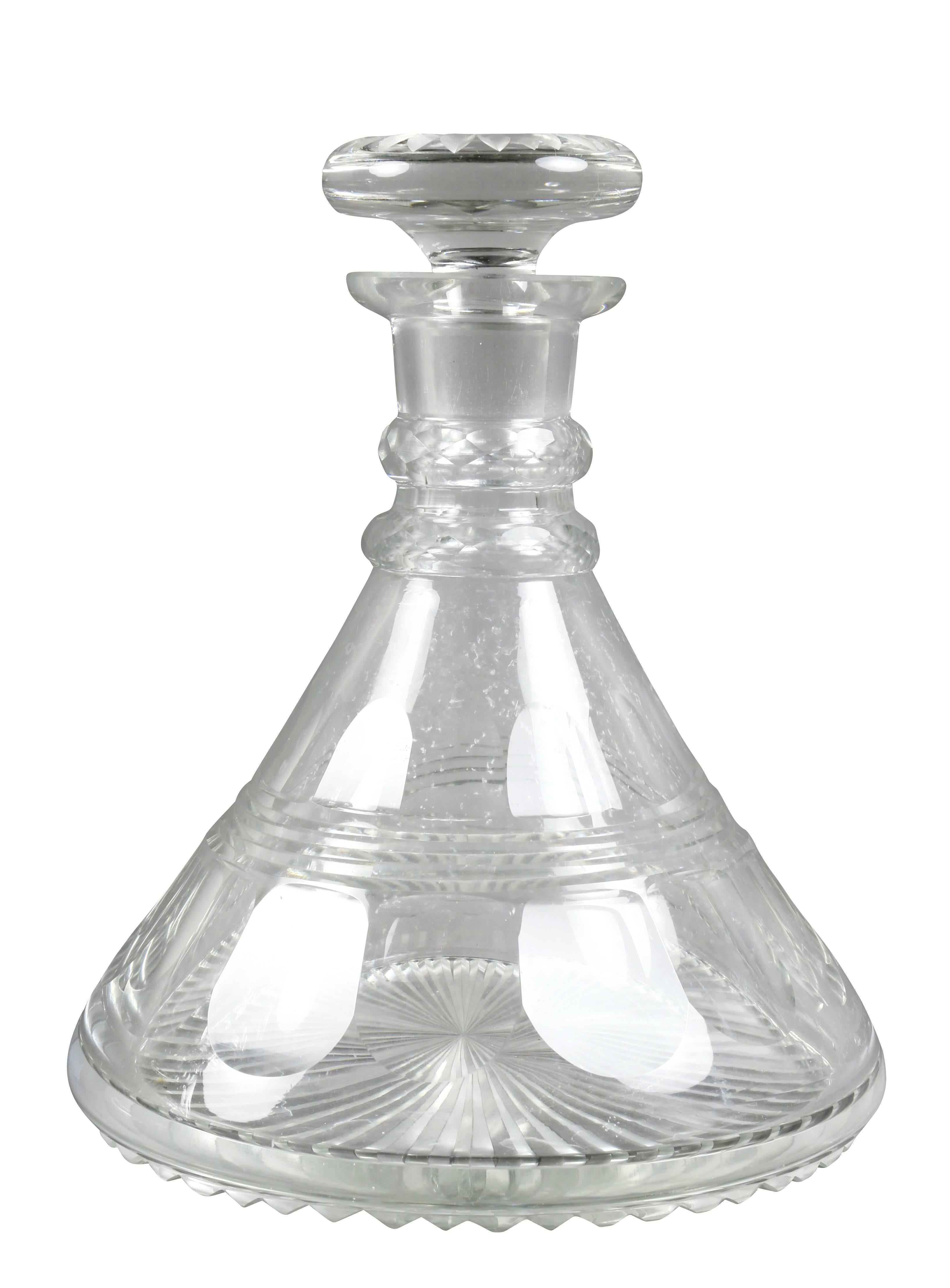 Each with a conical shape with stoppers. Anglo Irish style cut-glass.