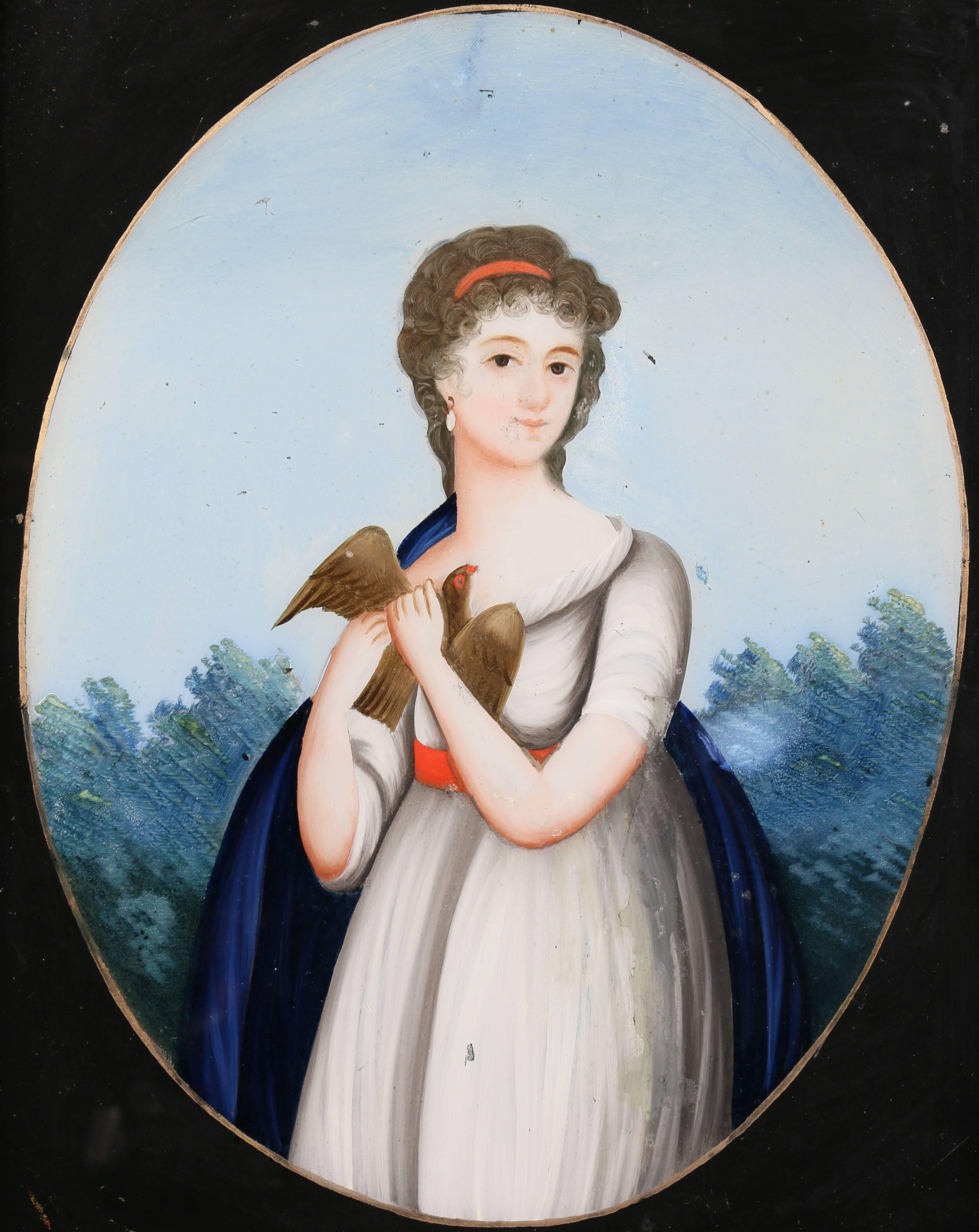 With period gadrooned frame, girl holding a bird with a blue cape in a landscape.